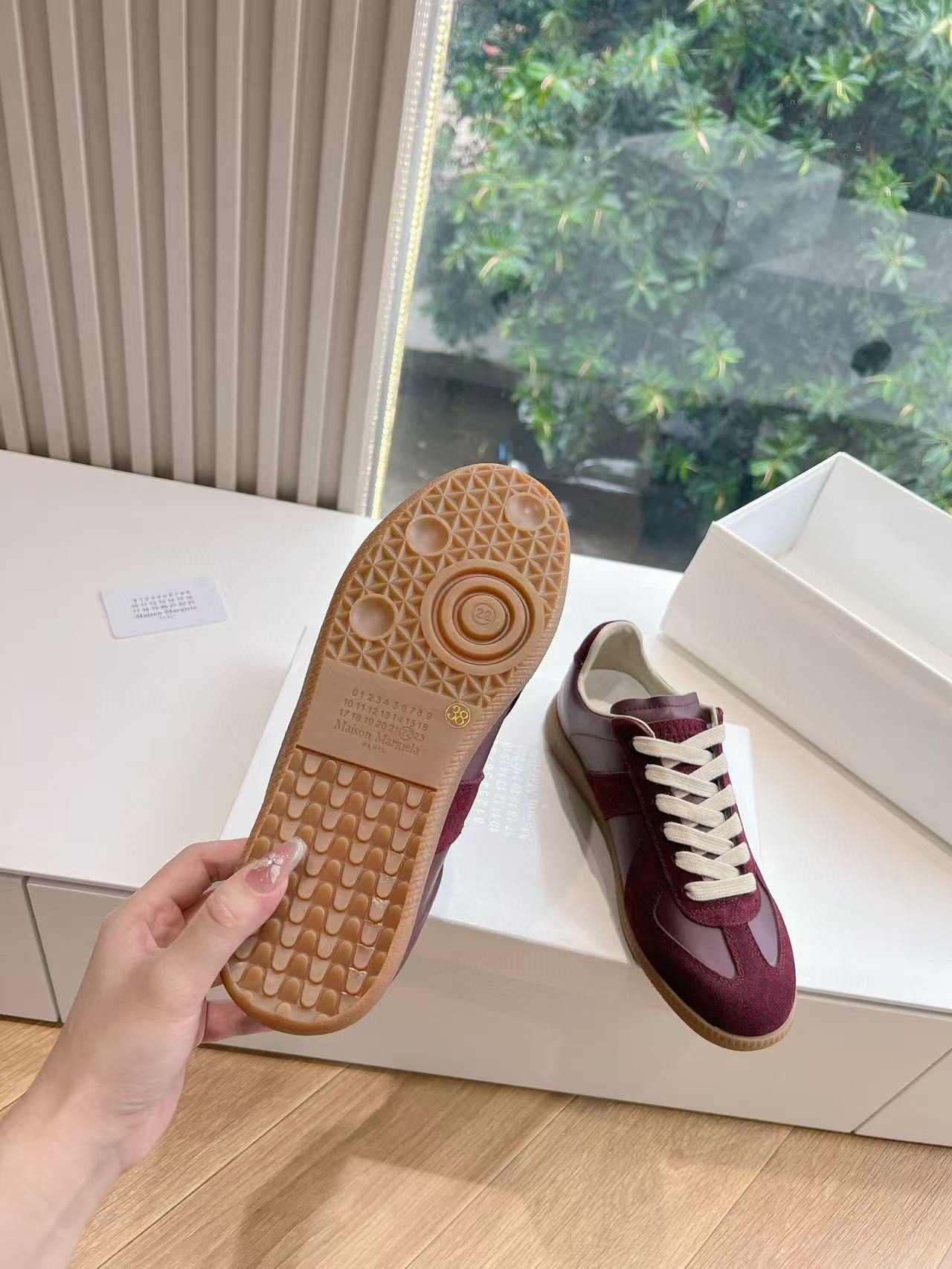 ua ma*s*n Ma*i*la mm6 sneakers