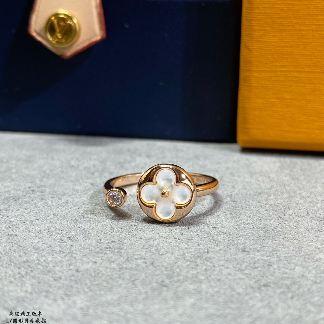 l0*is V*t0n round mother-of-pearl ring