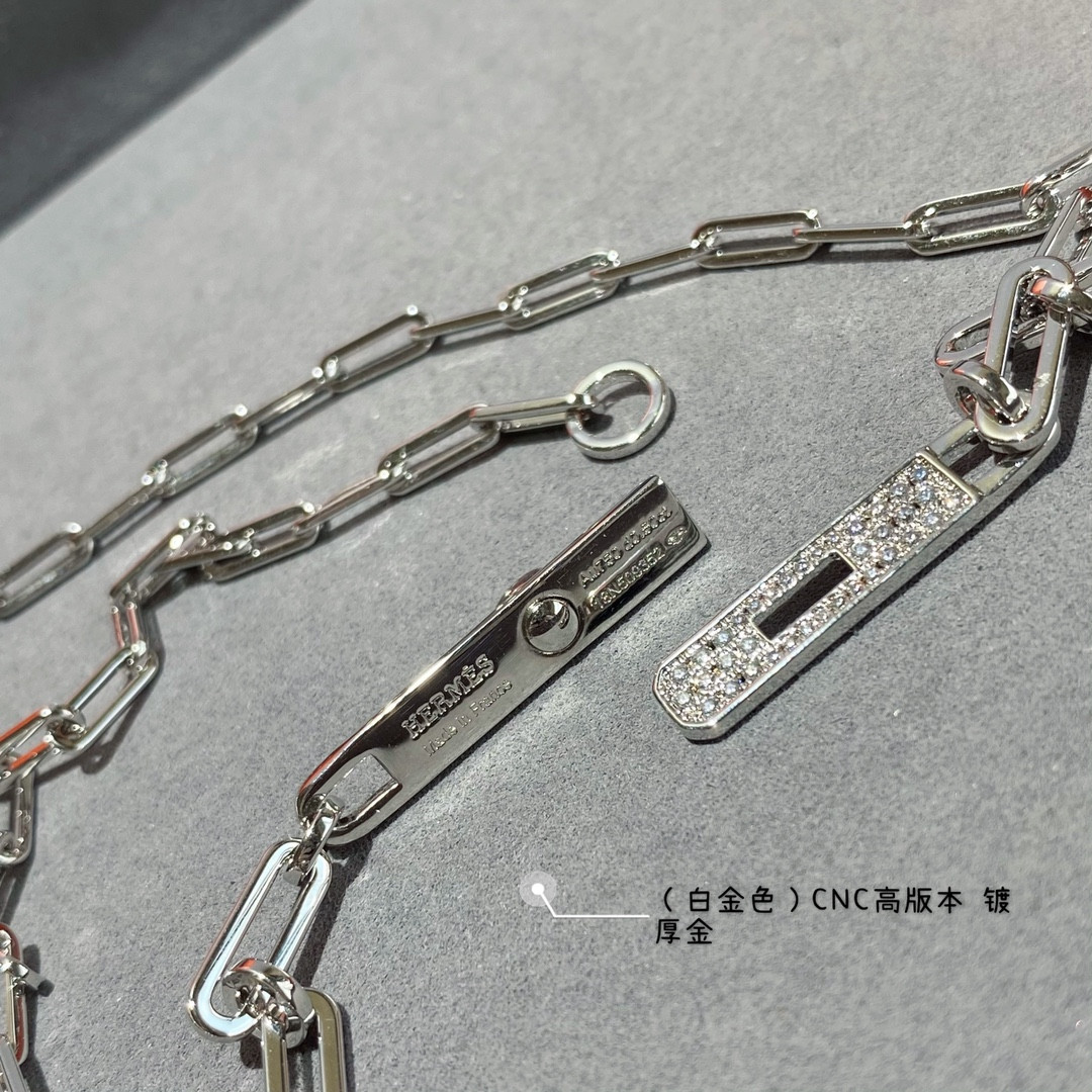 H**mes belt button necklace