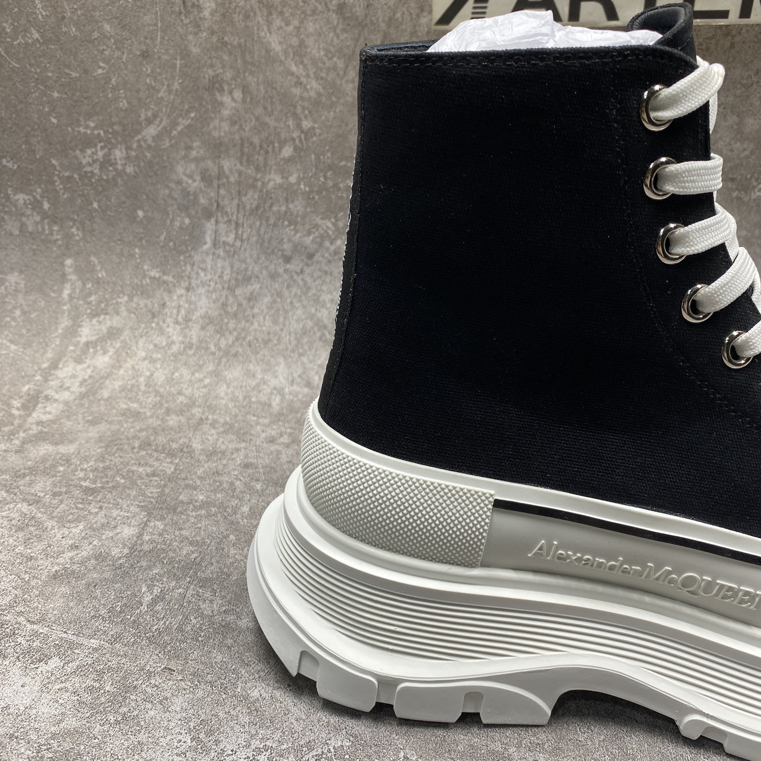 ale*d*r M*Q*en tread slick high lace up boot black white