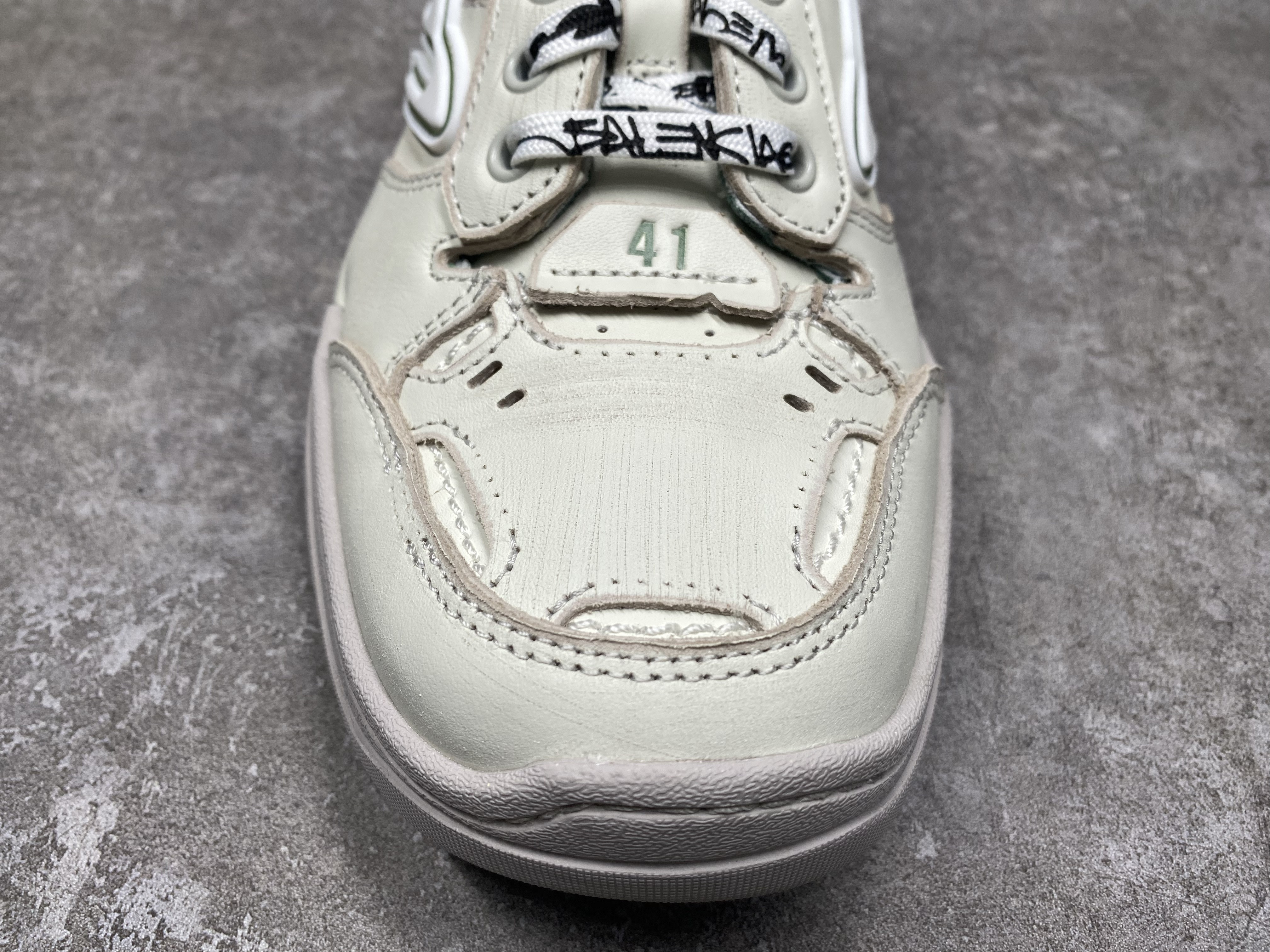 ua Ba*len*cia*ga hamptons worn-out sneaker (run one size large)