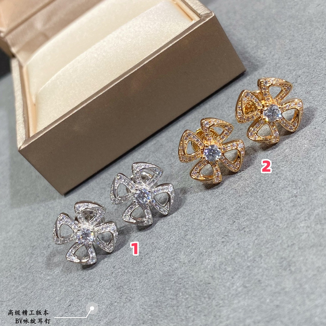 B*l*ai earrings