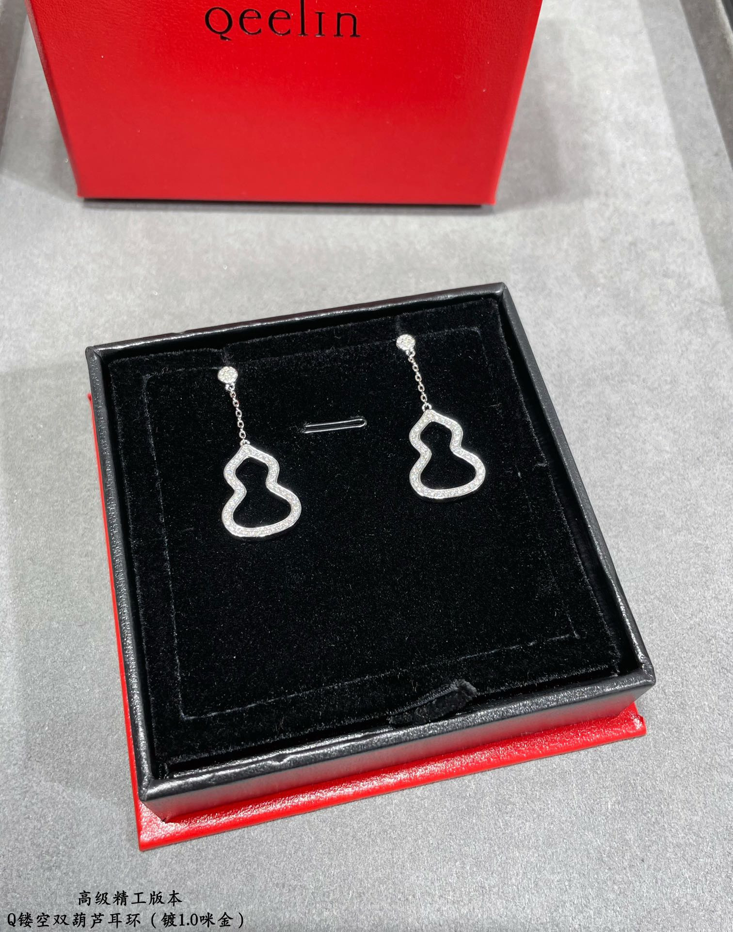 Qee1in double gourd earrings
