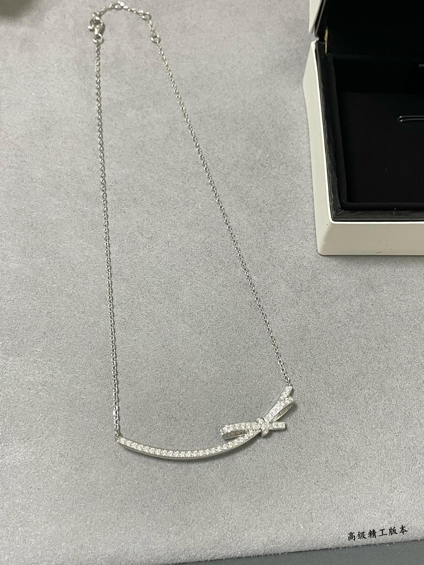 Ch*el bow tie necklace