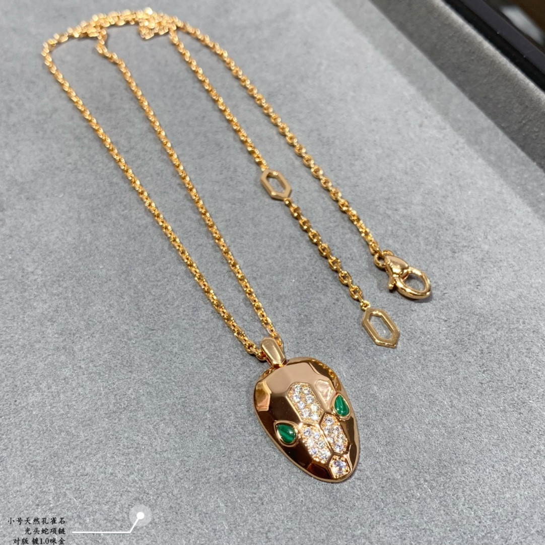 B*l*ai small bald snake necklace