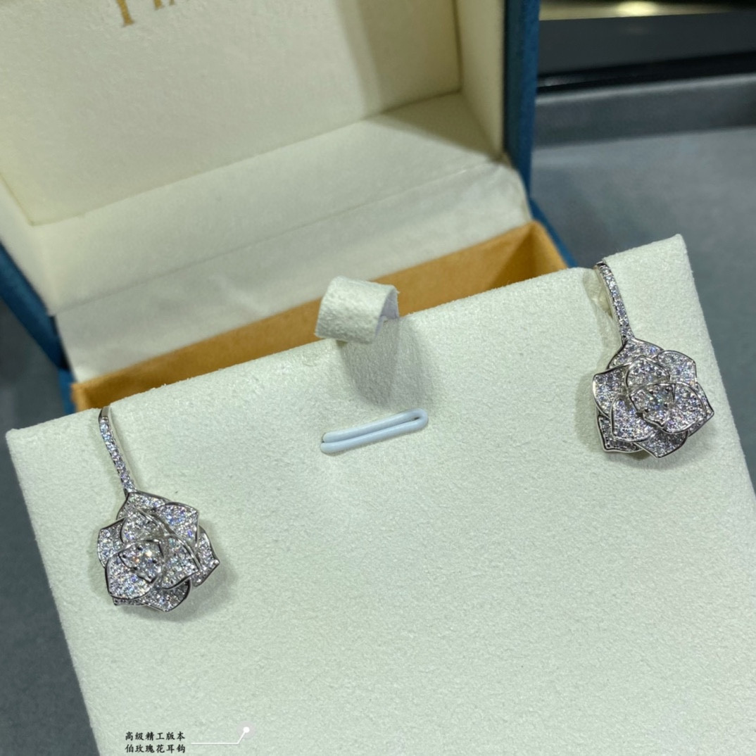 P1aget rose earrings