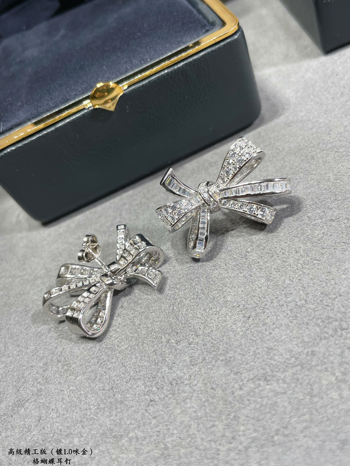 Gr*ff butterfly earrings