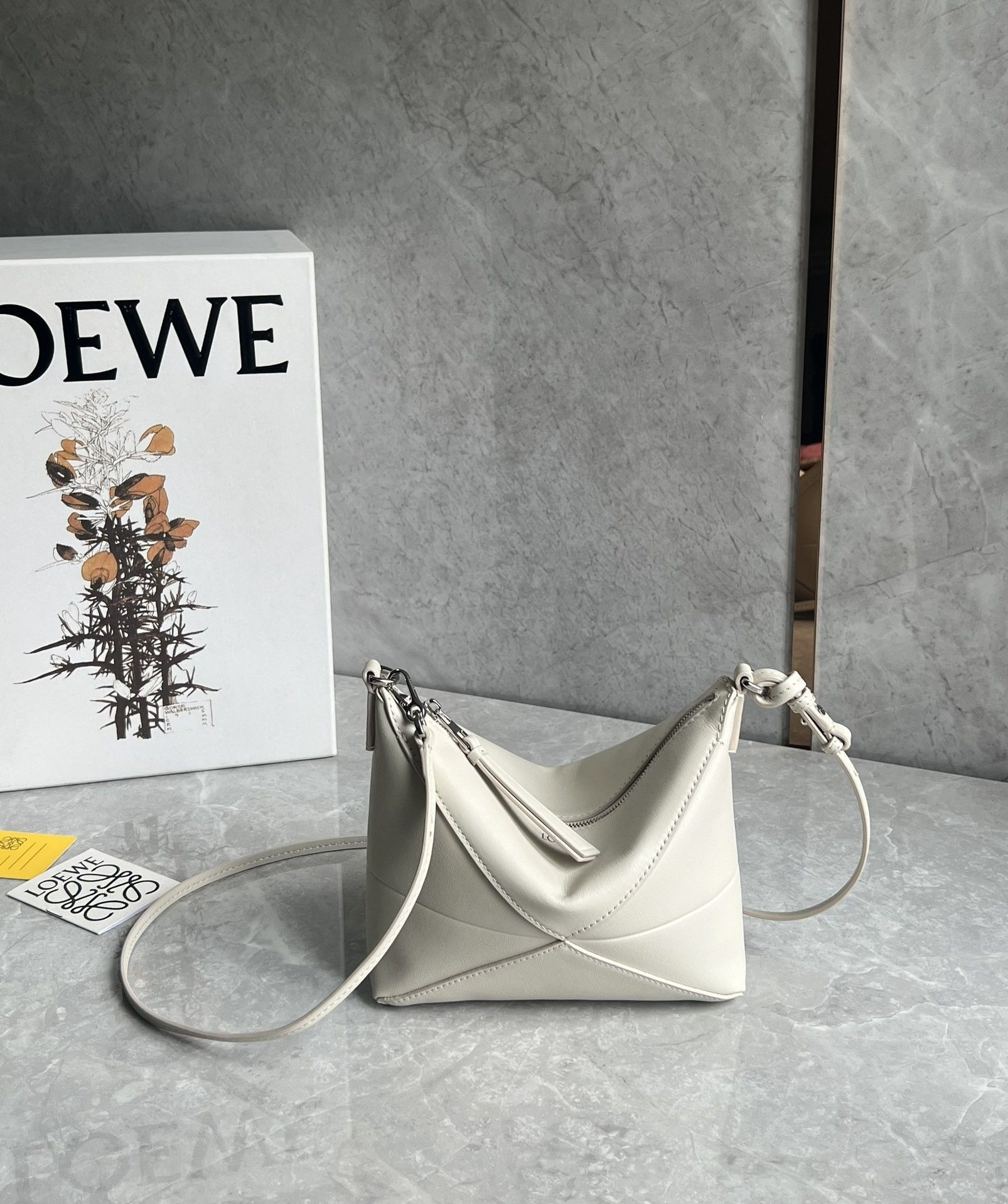 L0ew* puzzle fold pouch in shiny nappa calfskin 15.5x23x6.5cm