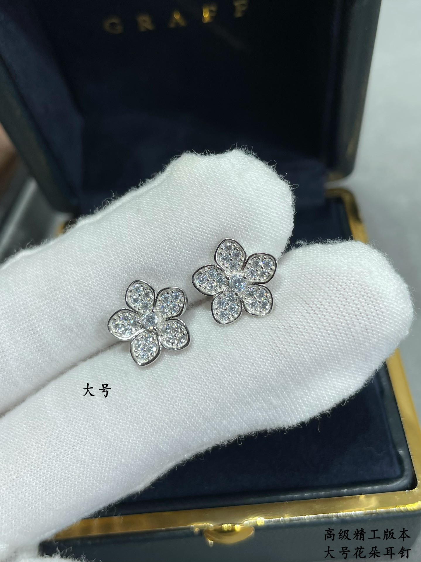 Gr*ff large flowers earrings