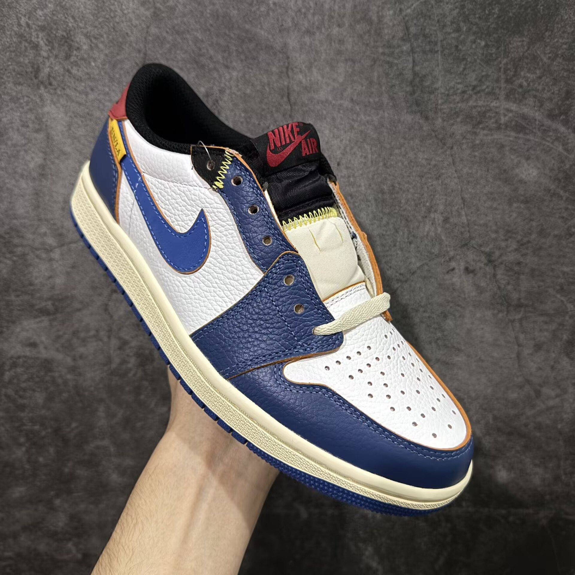 UA Air Jordan 1 Retro Low OG Storm Blue