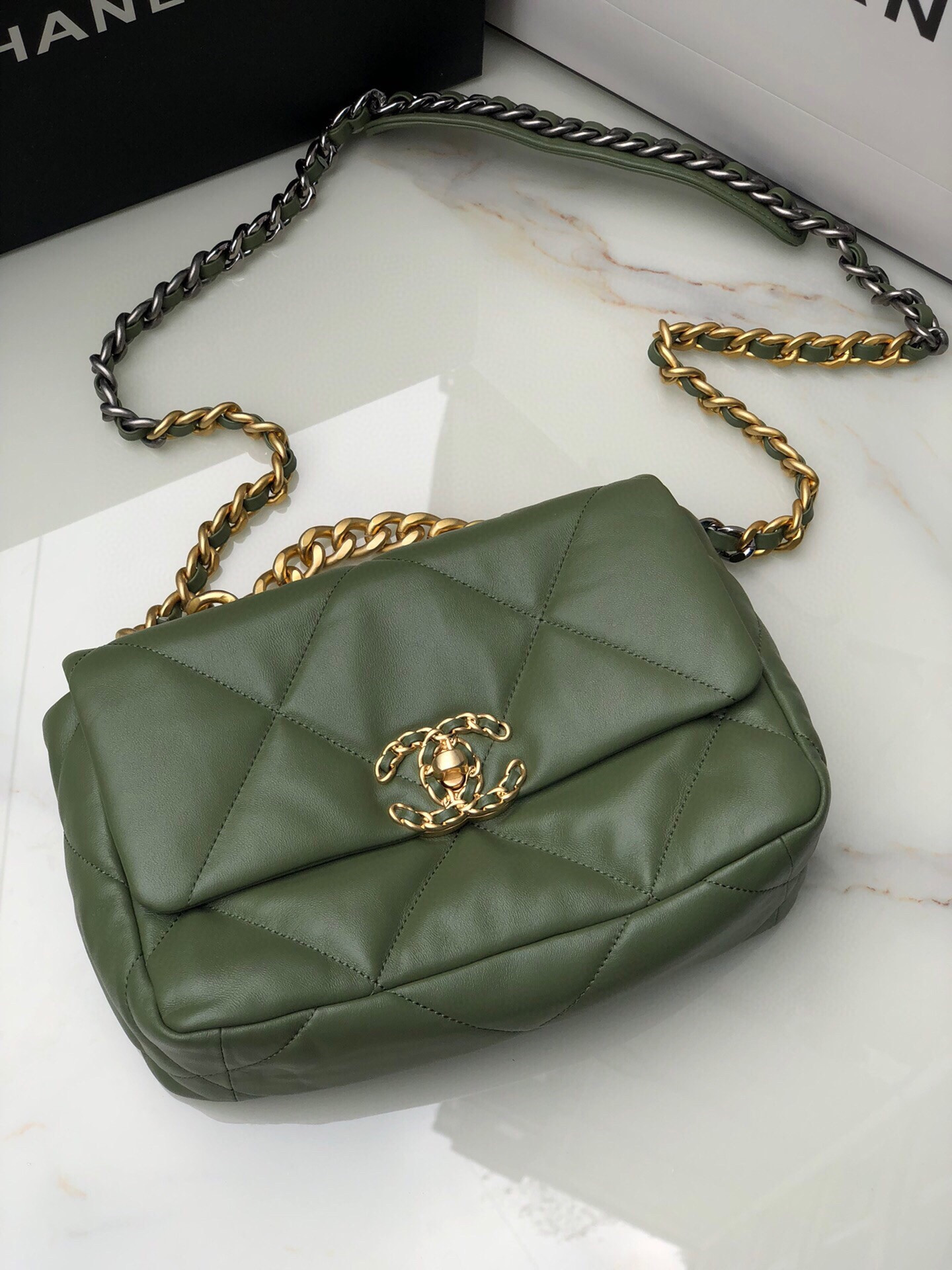 Ch*el 19 handbag shiny leather, gold-tone 16×26×9cm