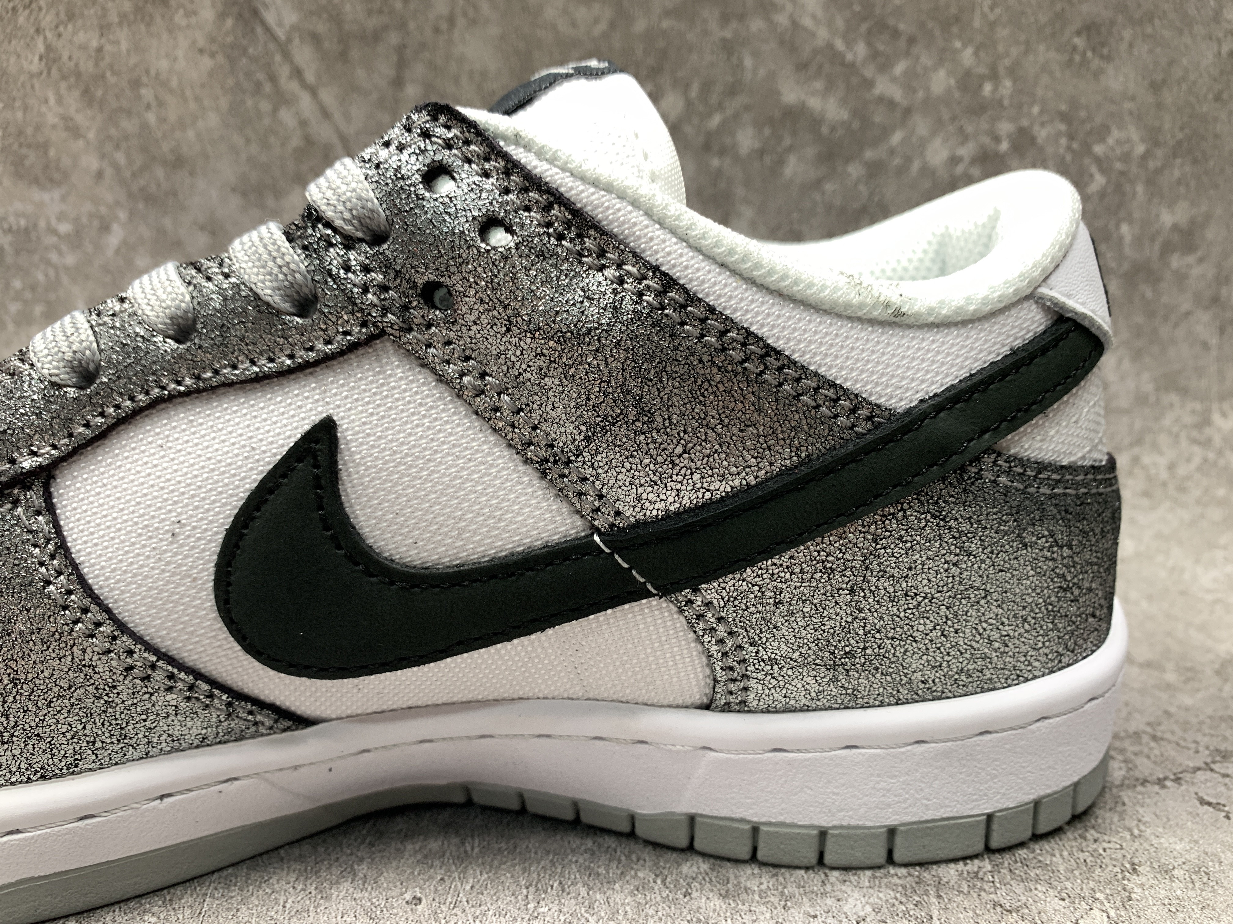 Nike Dunk Low Features Silver Cracked Leather
