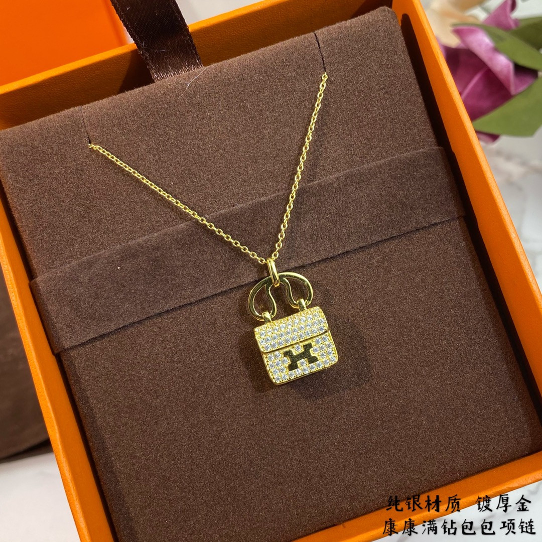 H**mes fully di*m*nd-encrusted h bag necklace