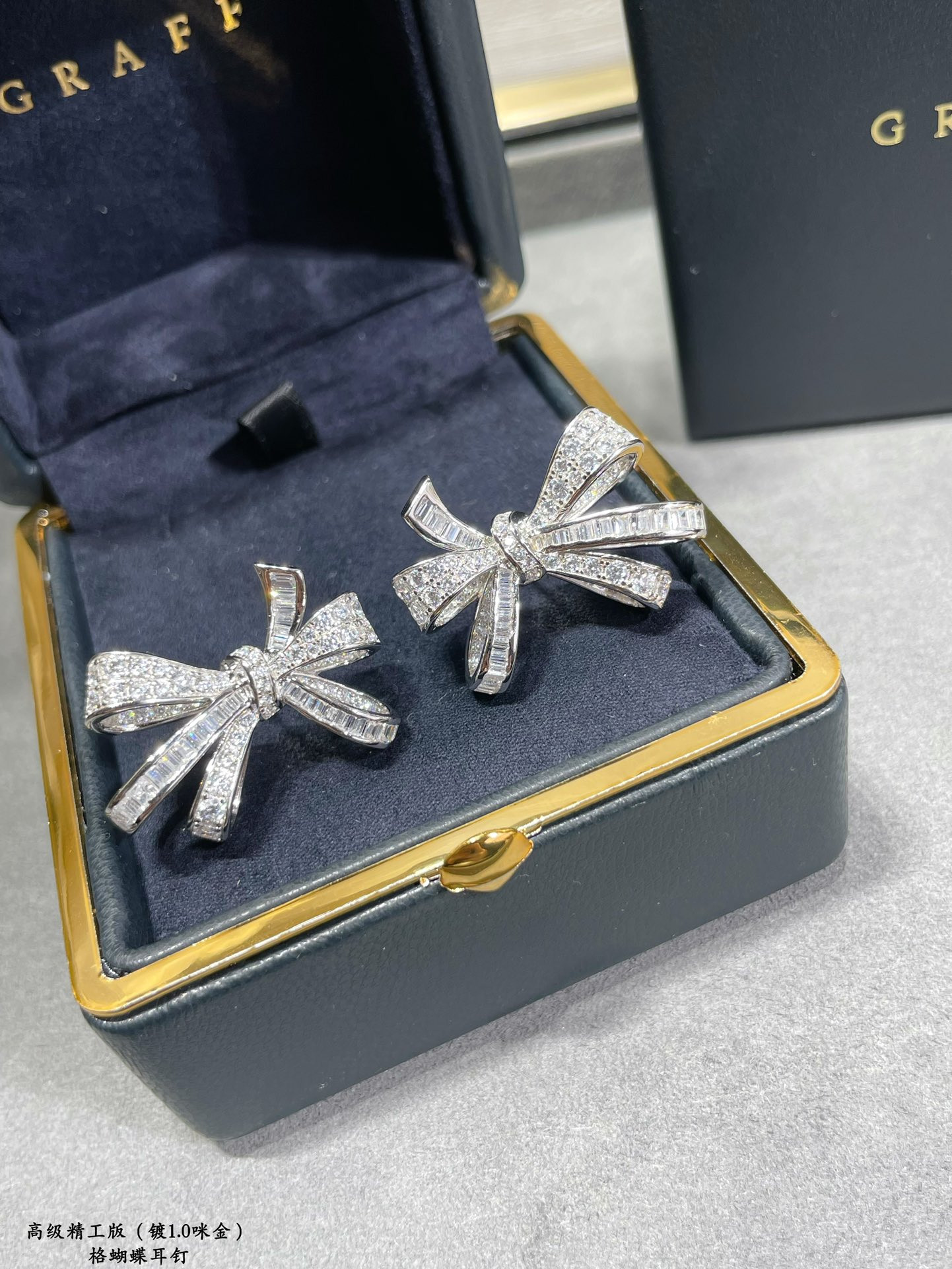 Gr*ff butterfly earrings
