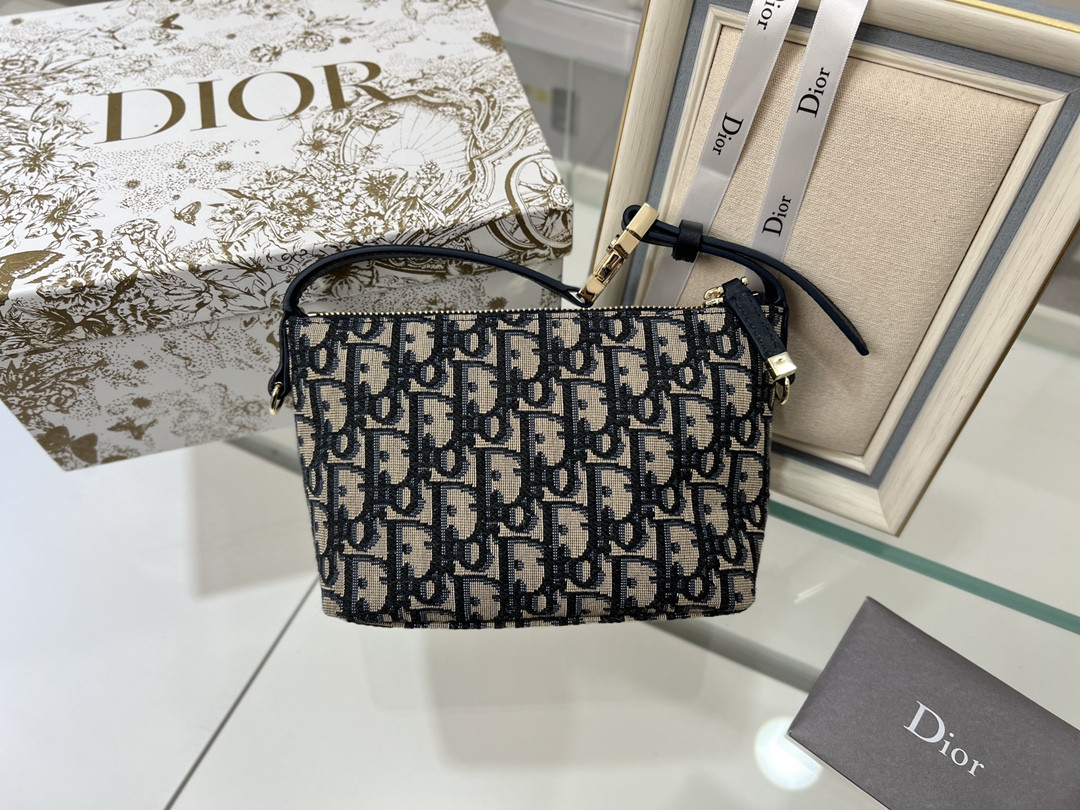 D*or travel nomad pouch blue D*or oblique jacquard