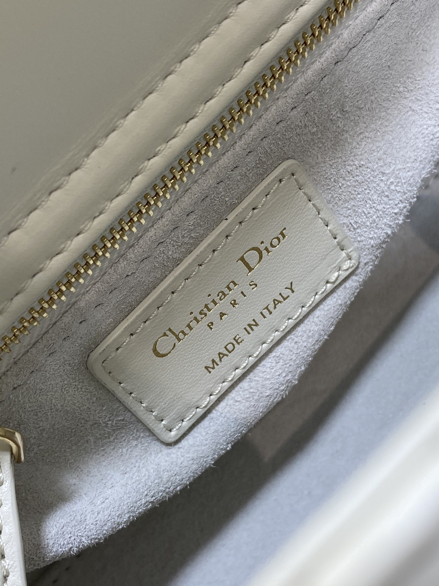 small lady D*or white with butterfly studs