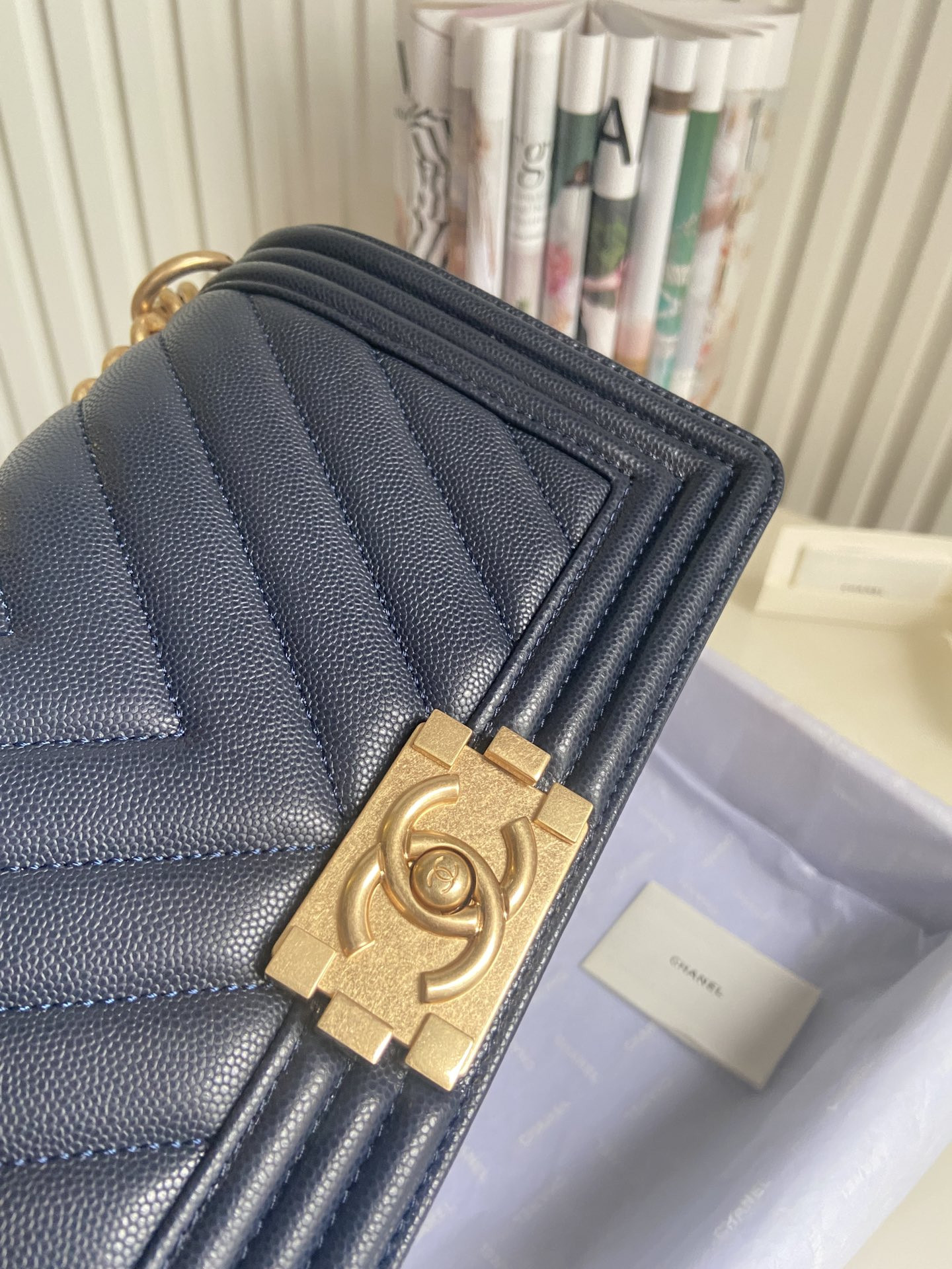 boy Ch*el handbag shiny grained calfskin & gold-tone metal navy 5.9 × 9.8 × 3.5 in