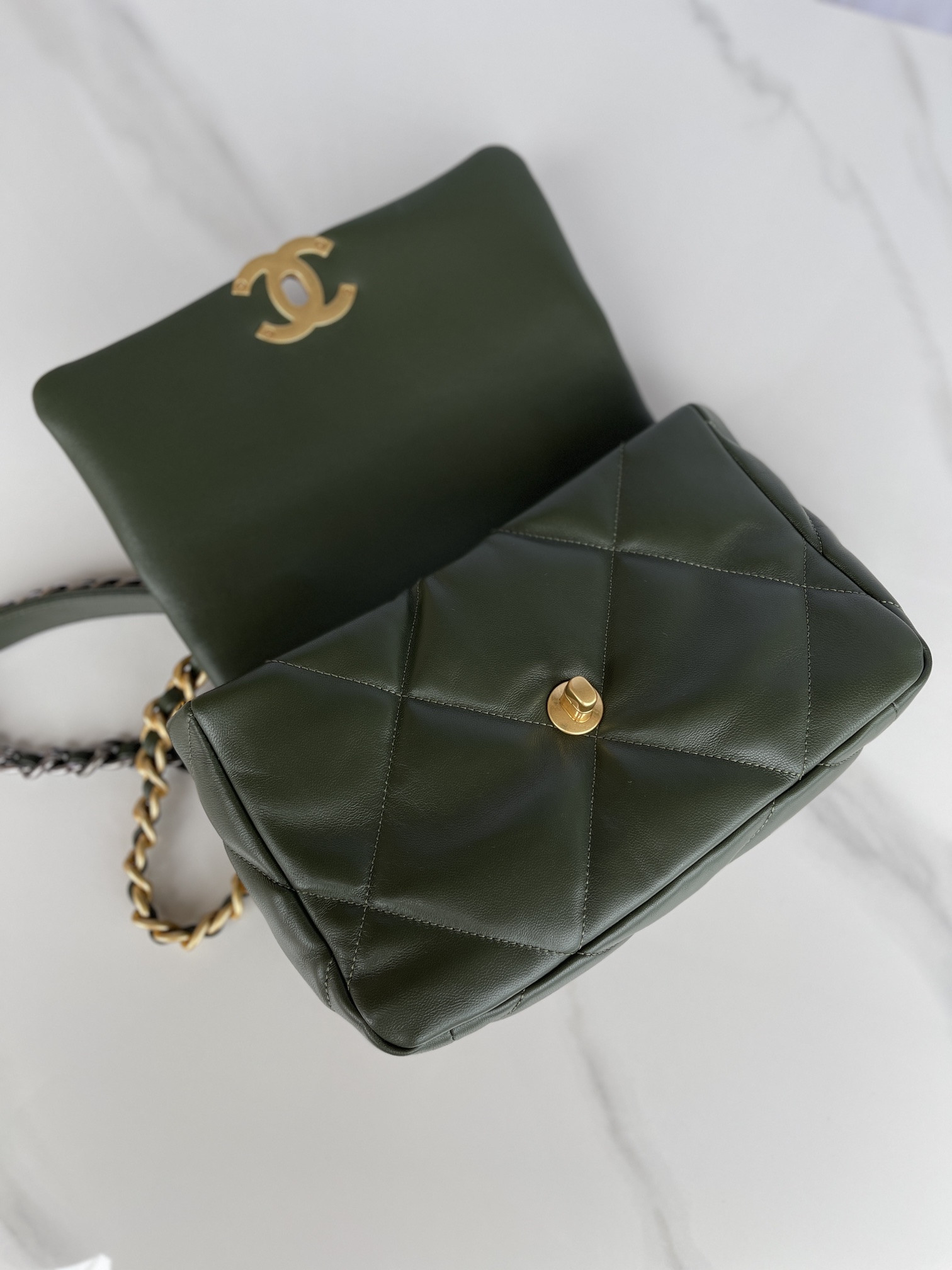 Ch*el 19 handbag shiny leather, gold-tone, silver-tone & ruthenium-finish metal dark green 6.2 × 10.1 × 3.5 in
