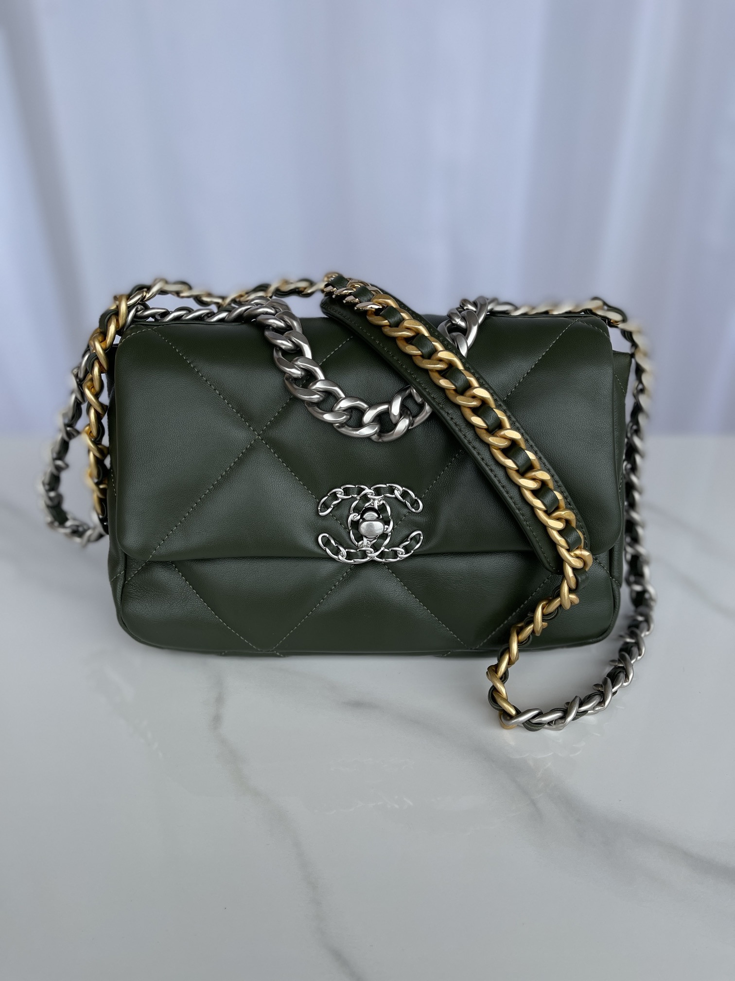 Ch*el 19 handbag shiny leather, gold-tone, silver-tone & ruthenium-finish metal dark green 6.2 × 10.1 × 3.5 in