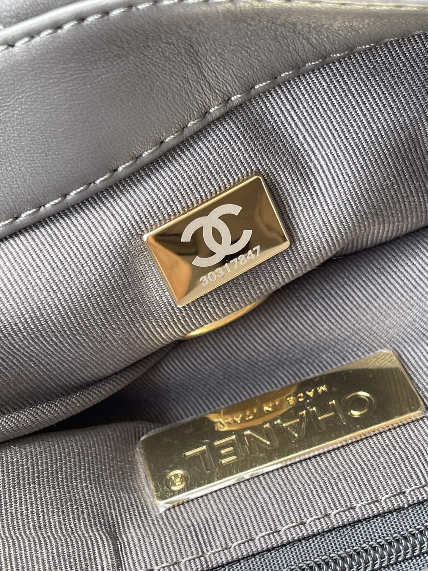 Ch*el 19 handbag shiny leather, gold-tone, silver-tone & ruthenium-finish metal dark gray 6.2 × 10.1 × 3.5 in