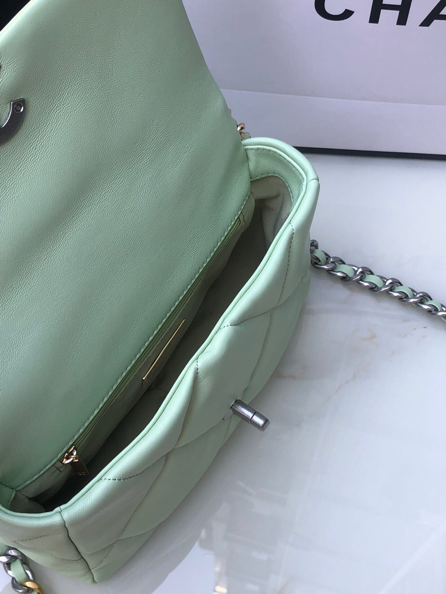 Ch*el 19 handbag shiny leather, gold-tone, silver-tone & ruthenium-finish metal green 6.2 × 10.1 × 3.5 in