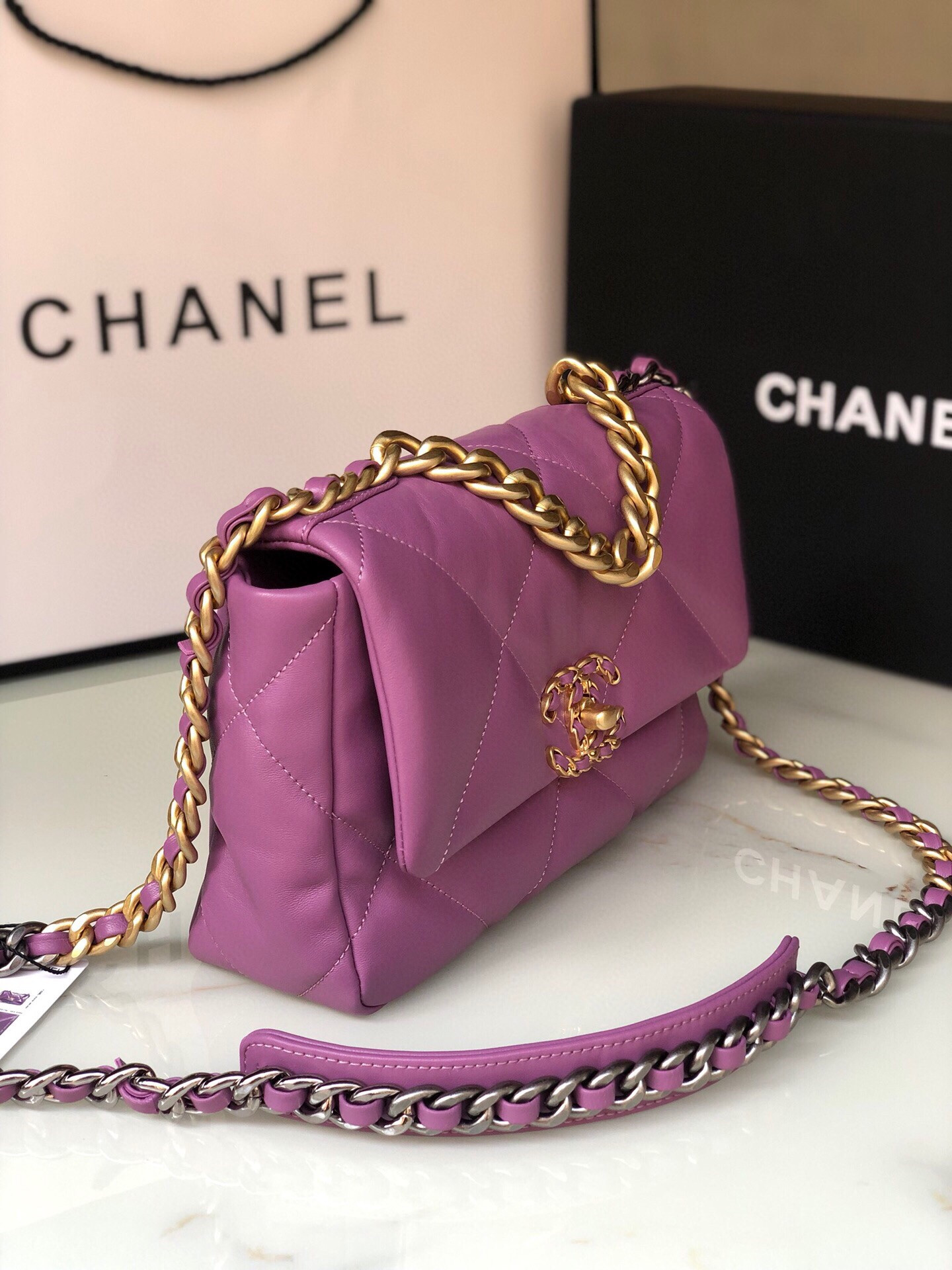 Ch*el 19 handbag shiny leather, gold-tone, silver-tone & ruthenium-finish metal purple 6.2 × 10.1 × 3.5 in