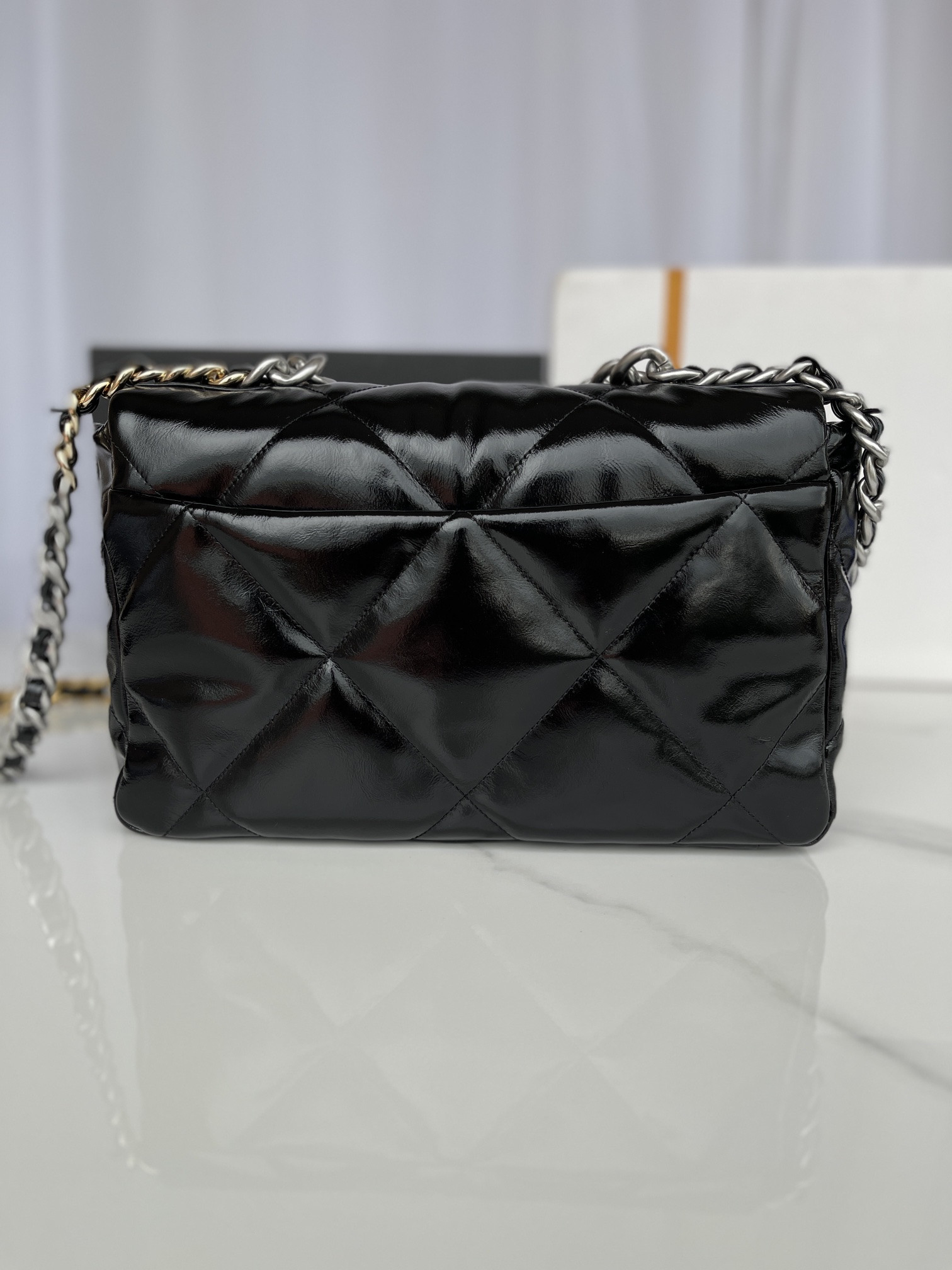 Ch*el 19 large handbag shiny leather, gold-tone, silver-tone & ruthenium-finish metal black 7.8 × 11.7 × 3.9 in