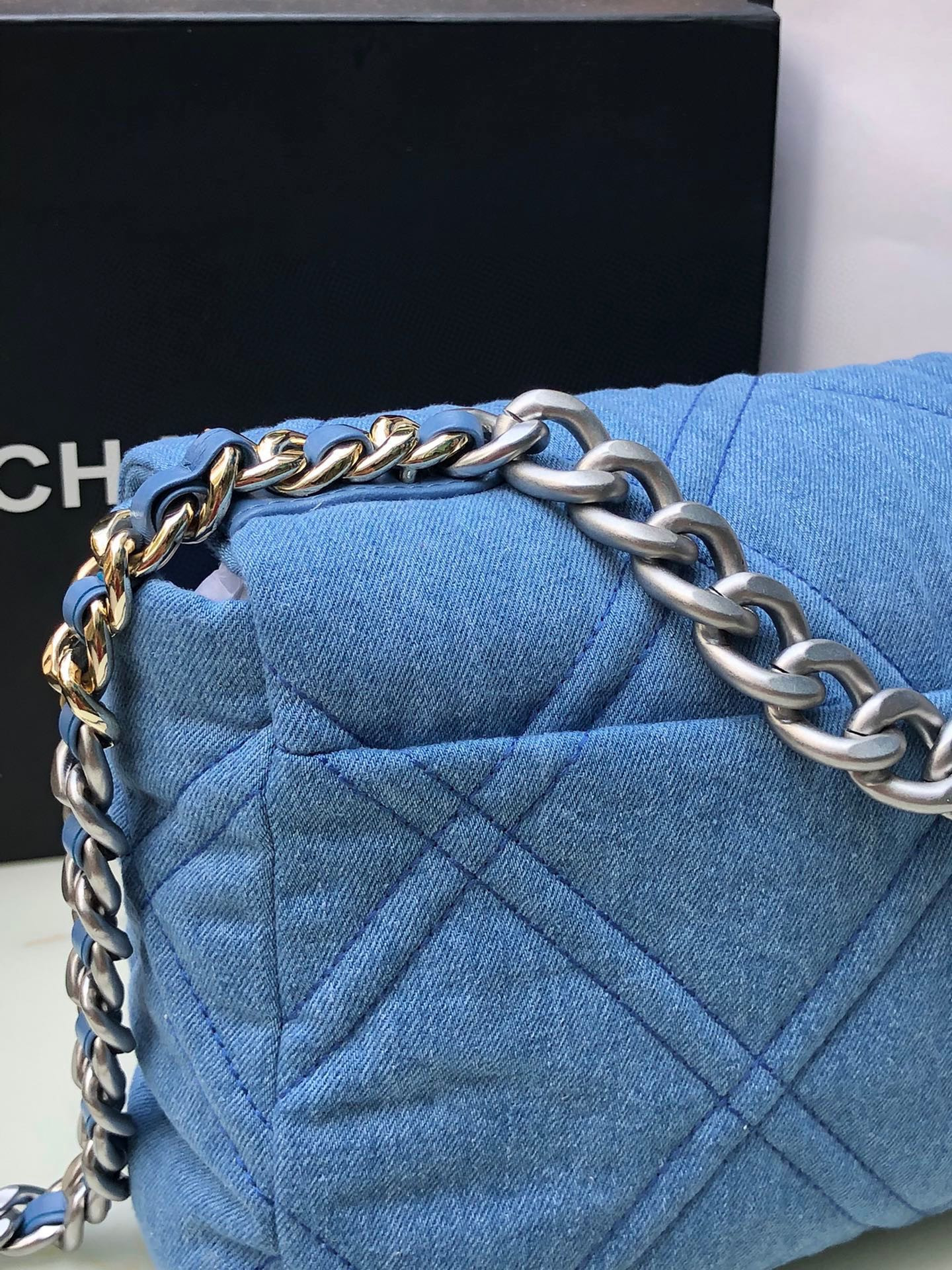 Ch*el 19 large handbag, gold-tone, silver-tone & ruthenium-finish metal blue 7.8 × 11.7 × 3.9 in