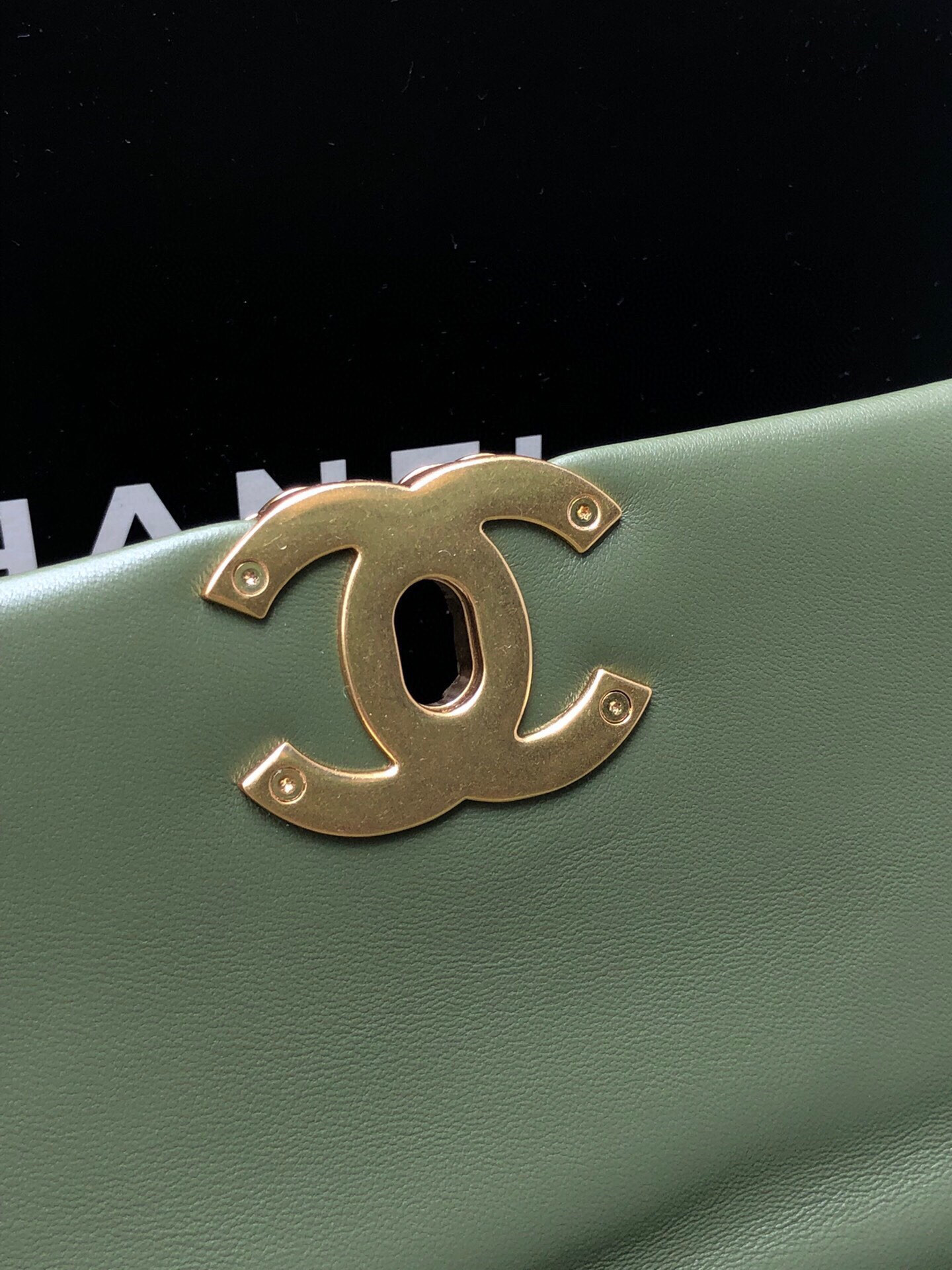 Ch*el 19 large handbag shiny leather, gold-tone, silver-tone & ruthenium-finish metal dark green 7.8 × 11.7 × 3.9 in