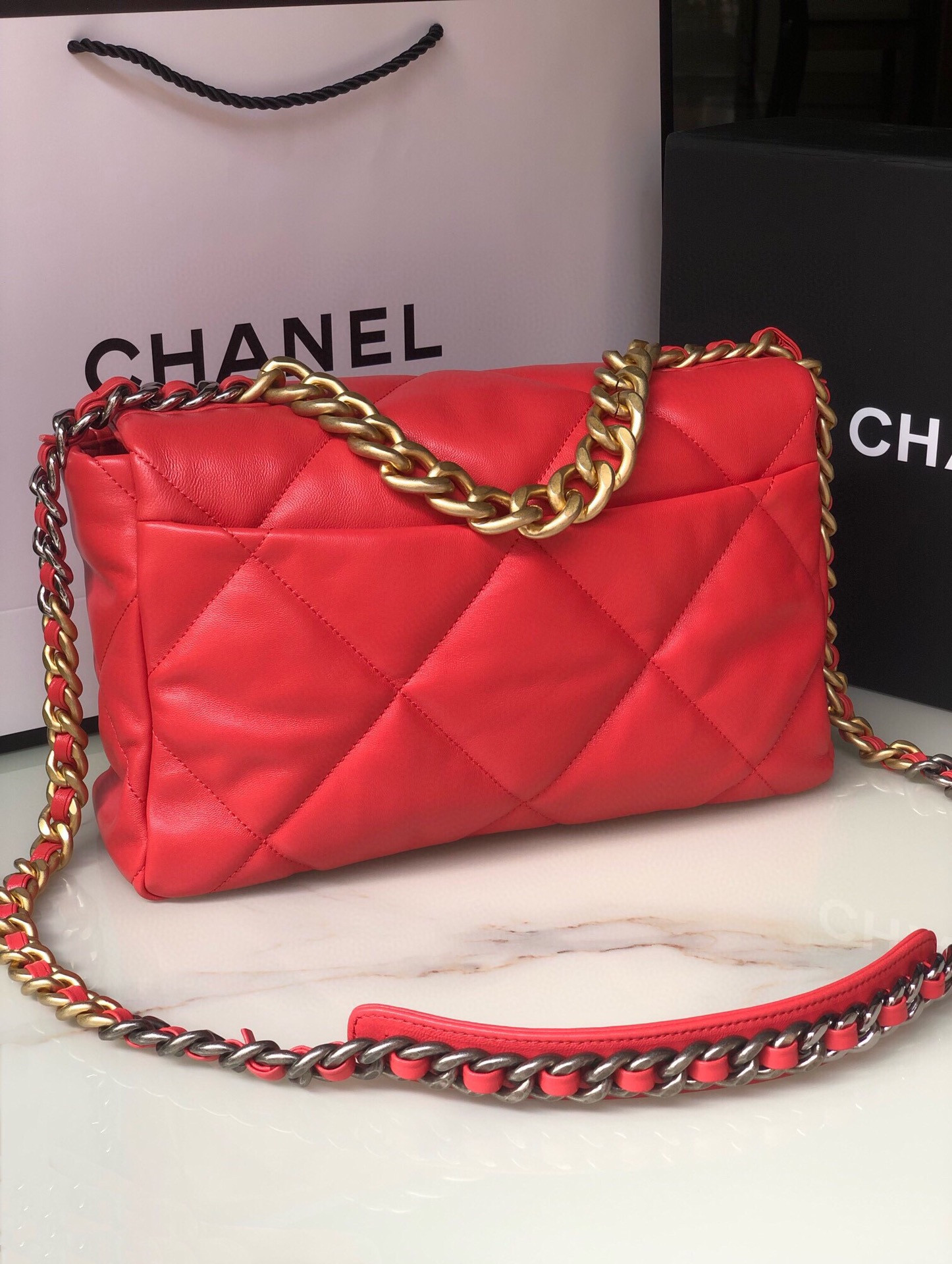 Ch*el 19 large handbag shiny leather red, gold-tone, silver-tone & ruthenium-finish metal 7.8 × 11.7 × 3.9 in