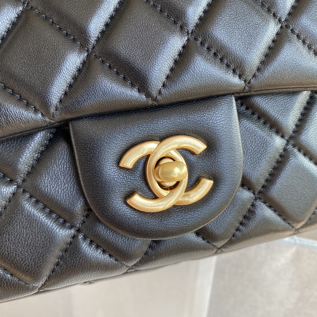 Ch*el mini flap bag shiny calfskin & gold-tone metal black 5.3 × 6.6 × 3.1 in