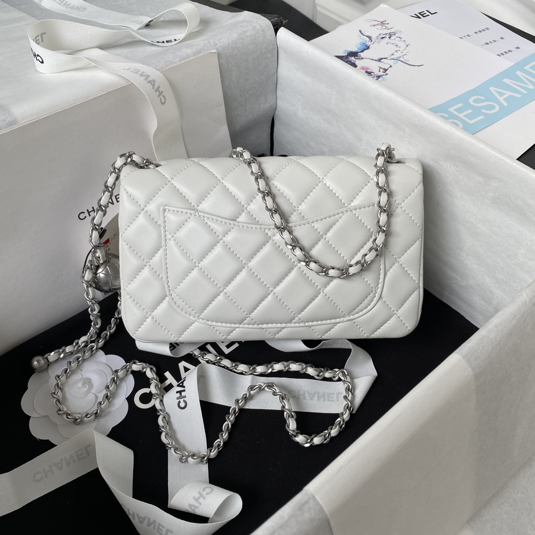 Ch*el mini flap bag shiny calfskin & silver-tone metal white 4.7 × 7.8 × 2.3 in