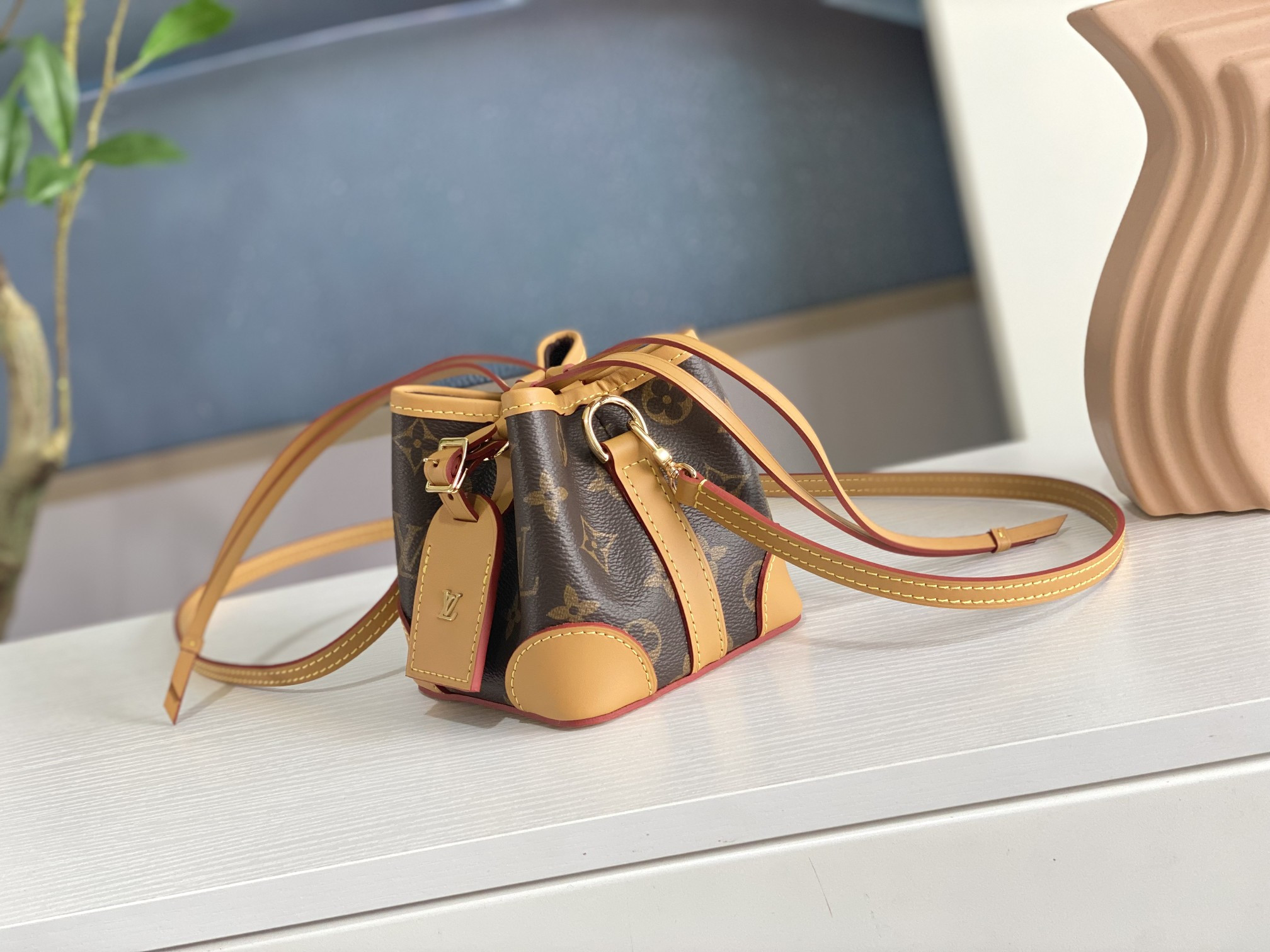 LV M57099 NOE PURSE 4.5 x 4.7 x 4.5 inches