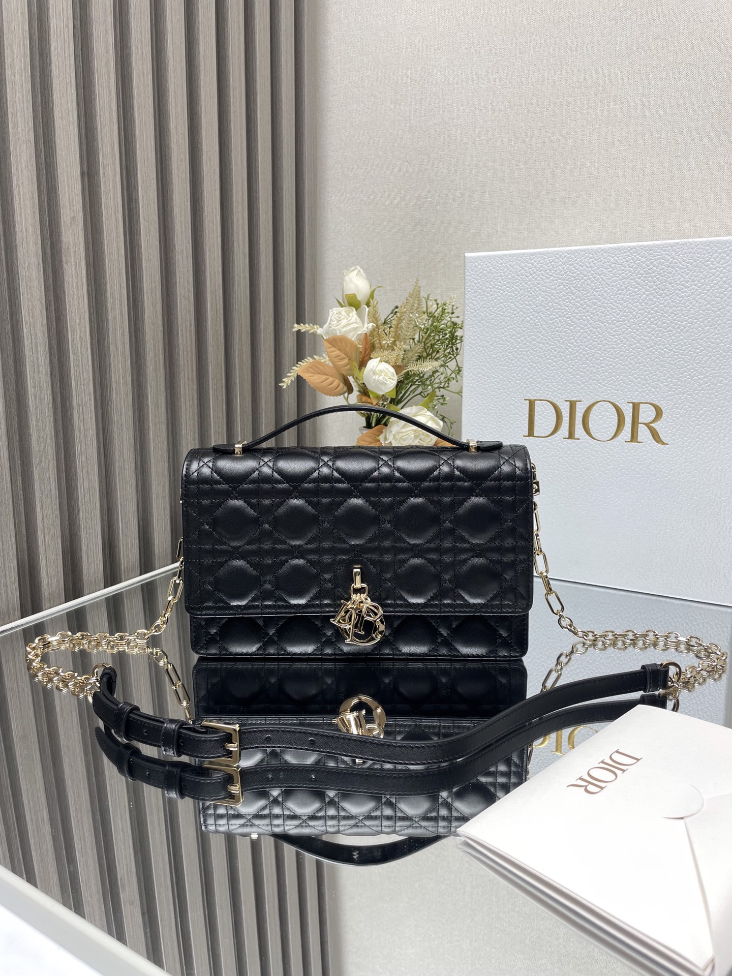 my D*or top handle bag black 9.5 x 5.5 x 3 inches