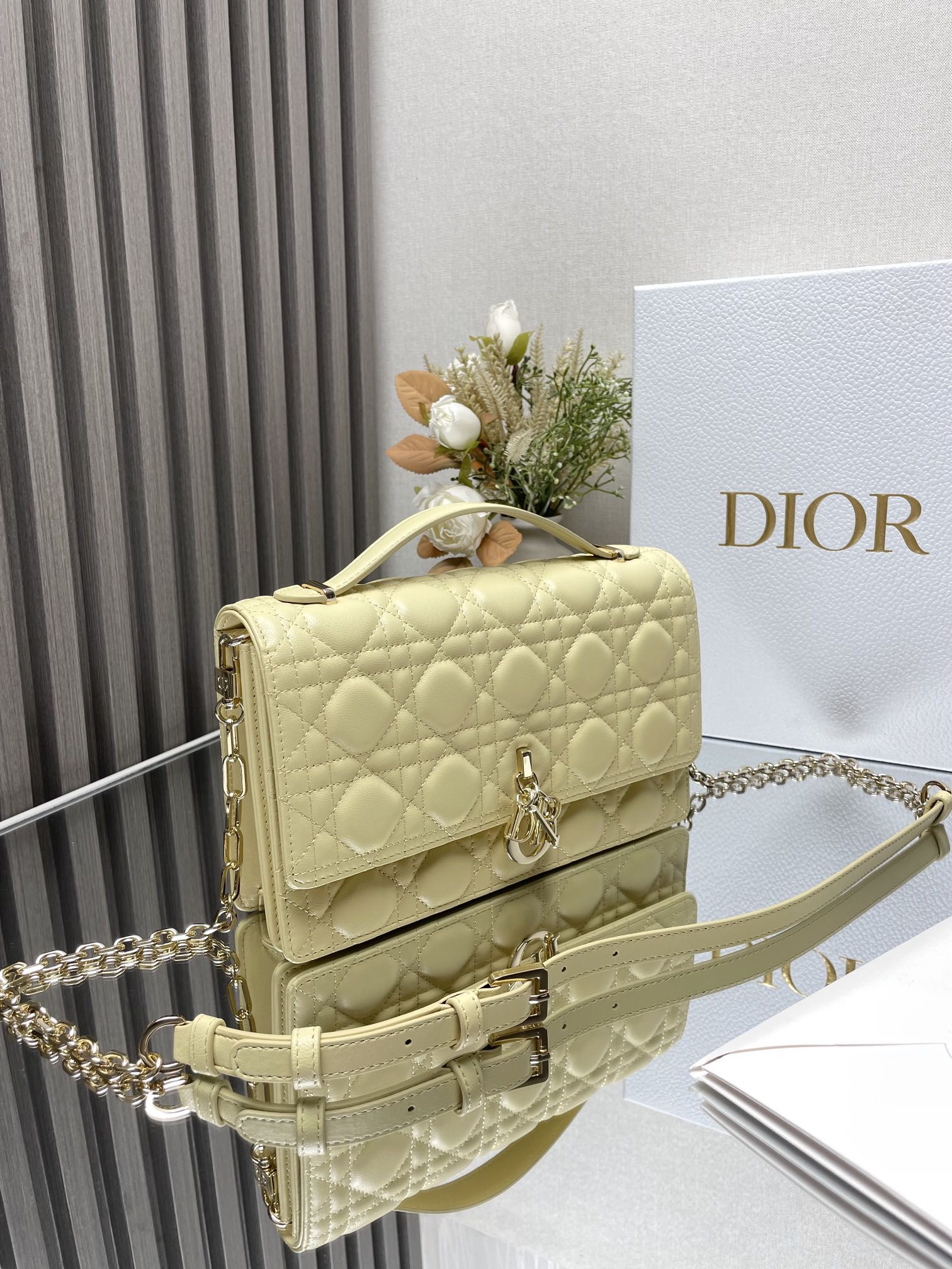 my D*or top handle bag 9.5 x 5.5 x 3 inches