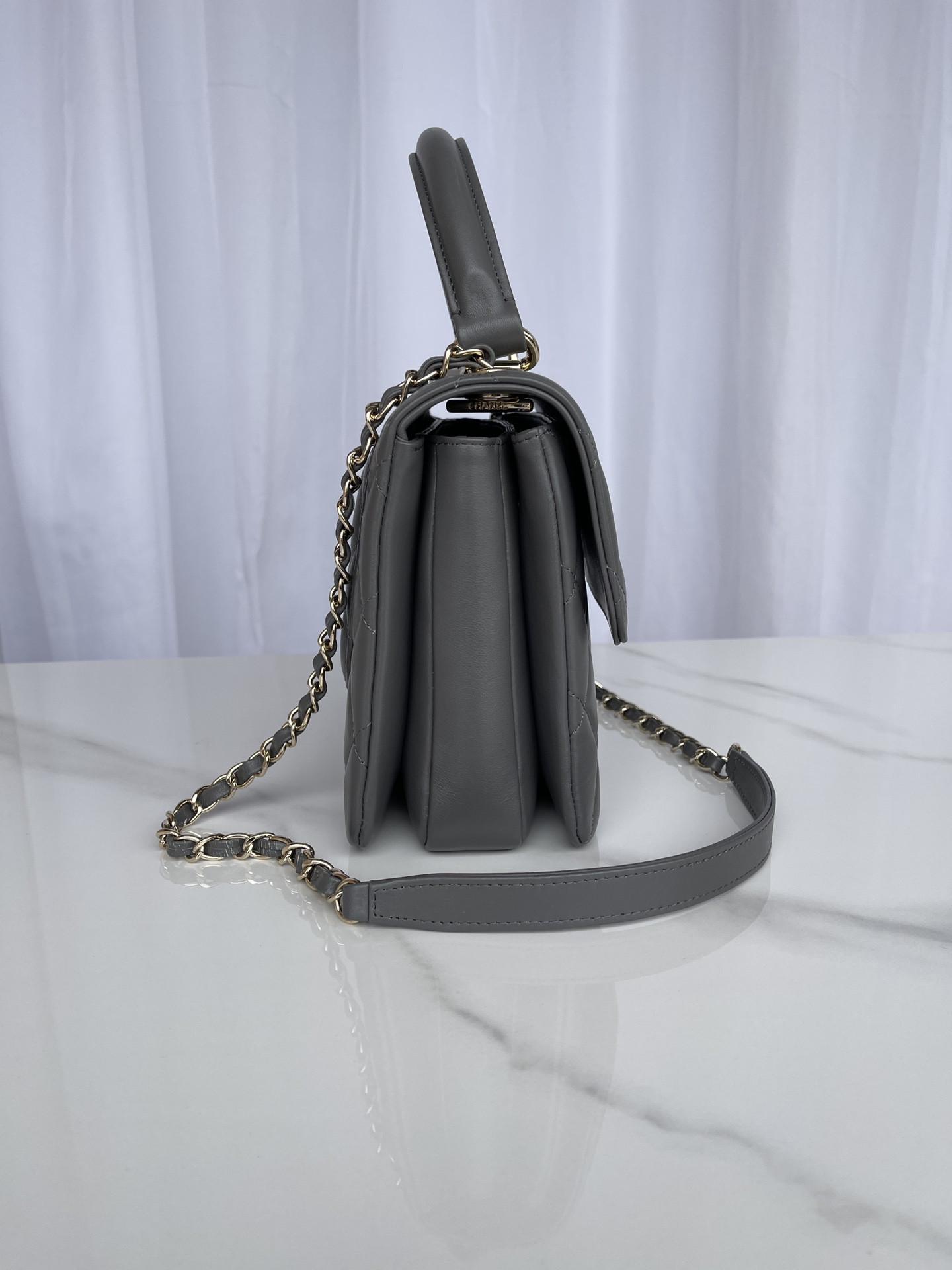 Ch*el flap bag with top handle 6.6 × 9.8 × 4.7 in