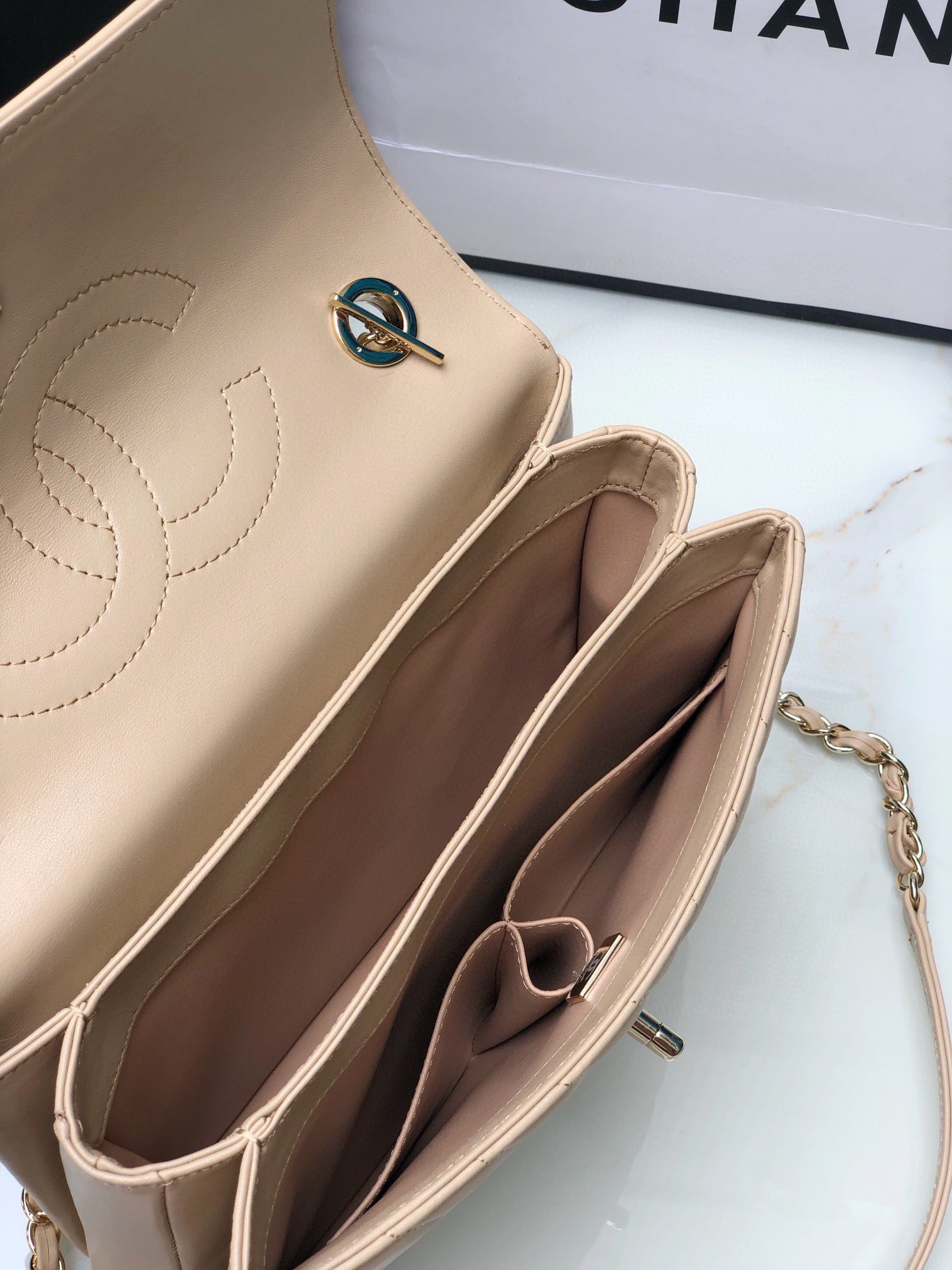 Ch*el flap bag with top handle beige 6.6 × 9.8 × 4.7 in