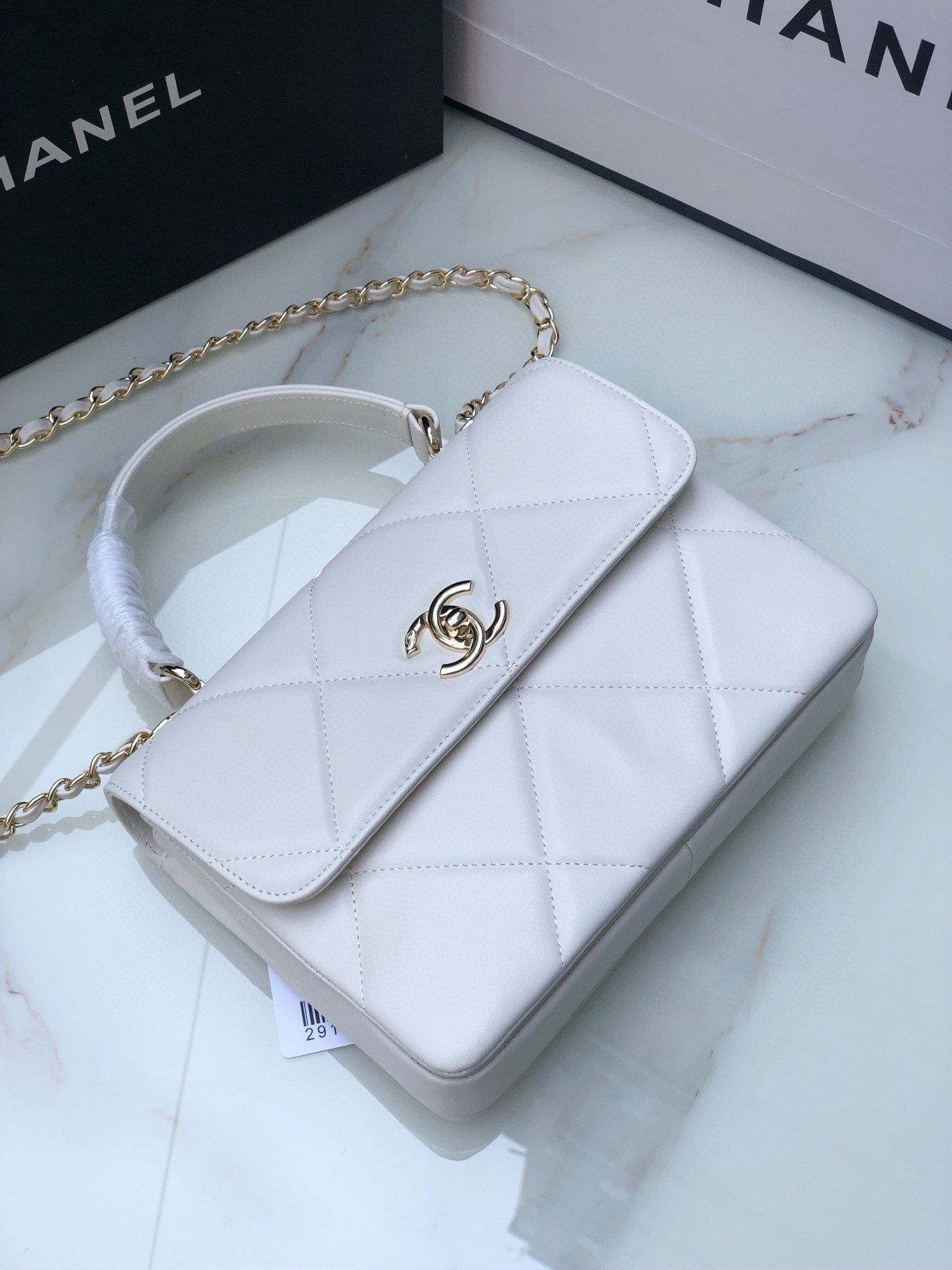 Ch*el flap bag with top handle 6.6 × 9.8 × 4.7 in