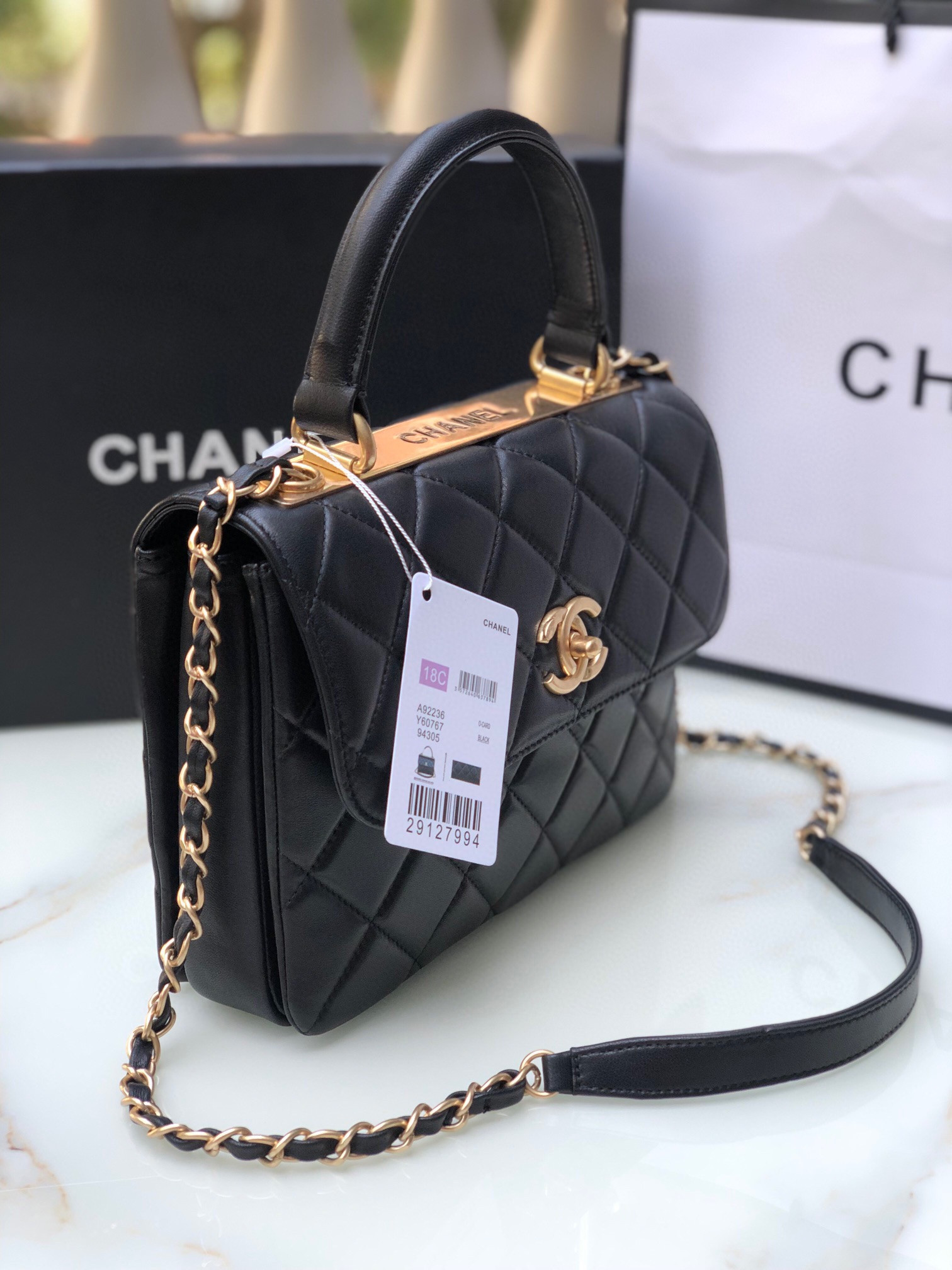 Ch*el flap bag with top handle 6.6 × 9.8 × 4.7 in