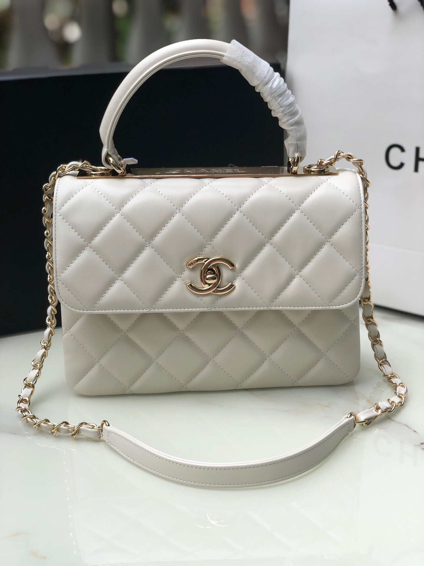 Ch*el flap bag with top handle 6.6 × 9.8 × 4.7 in