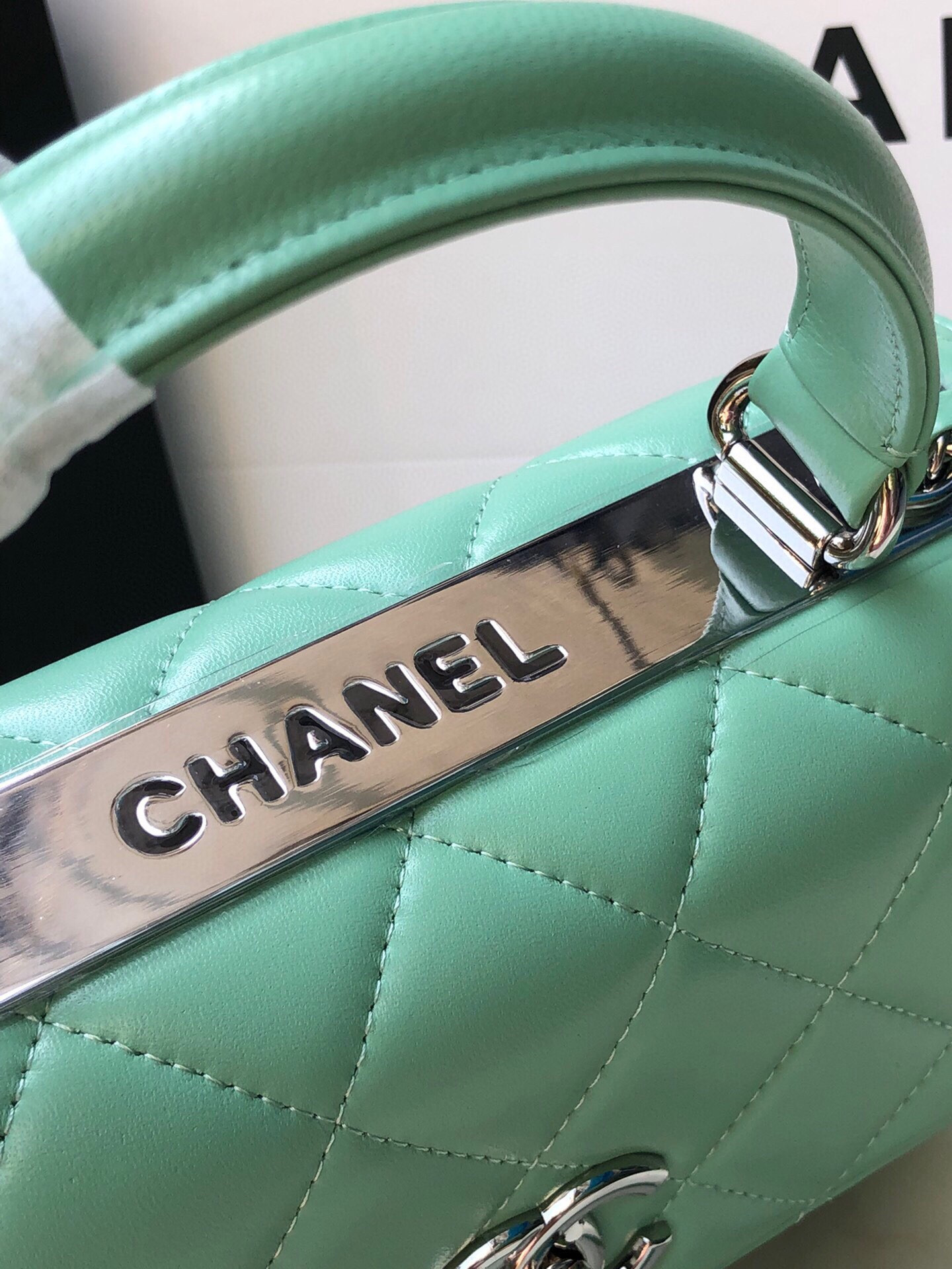 Ch*el flap bag with top handle 6.6 × 9.8 × 4.7 in