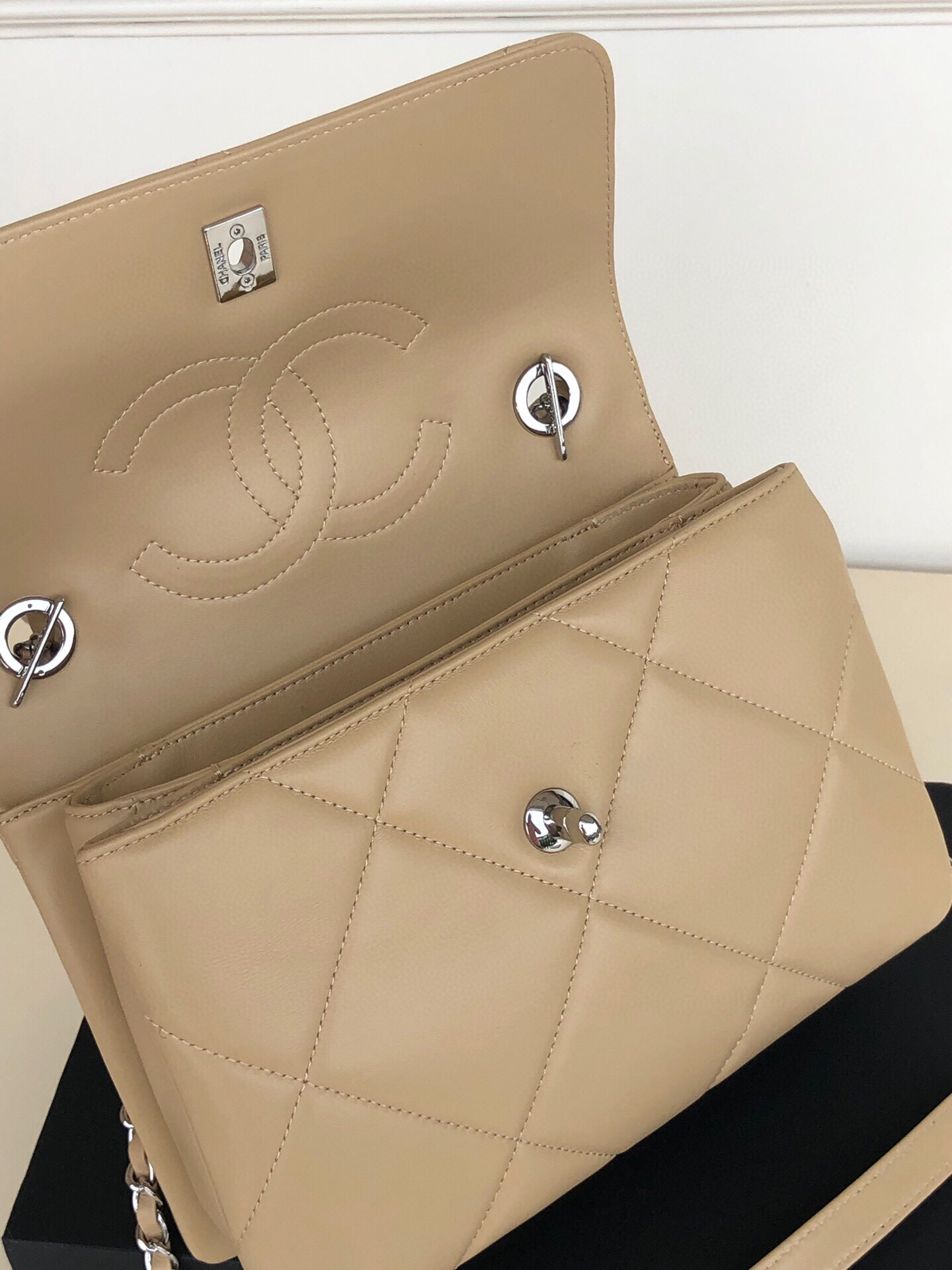 Ch*el flap bag with top handle 6.6 × 9.8 × 4.7 in
