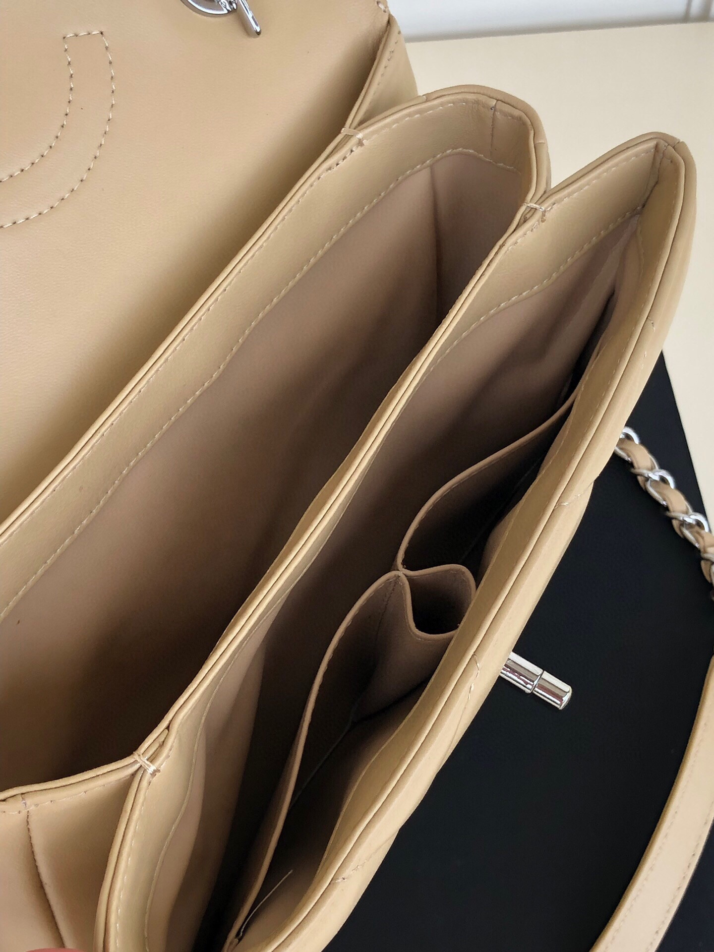 Ch*el flap bag with top handle 6.6 × 9.8 × 4.7 in