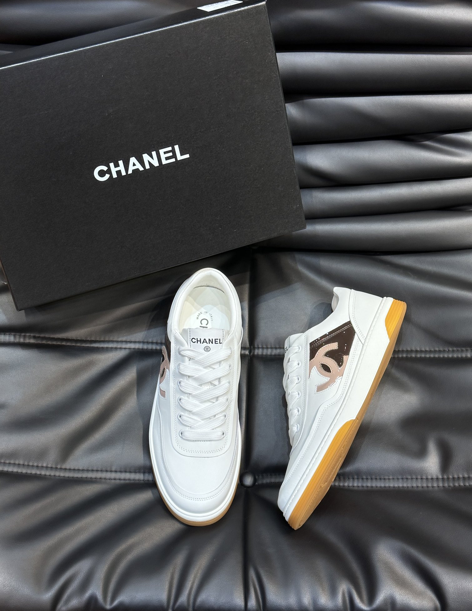 ua Ch*el sneaker calfskin