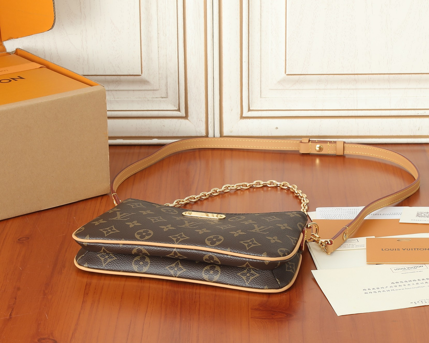 LV  Liv Pochette  M83008 9.6 x 5.3 x 2.6 inches