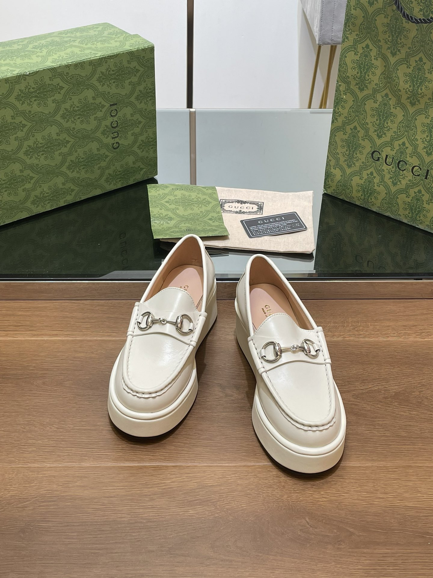 ua G*u*i horsebit wedge loafer