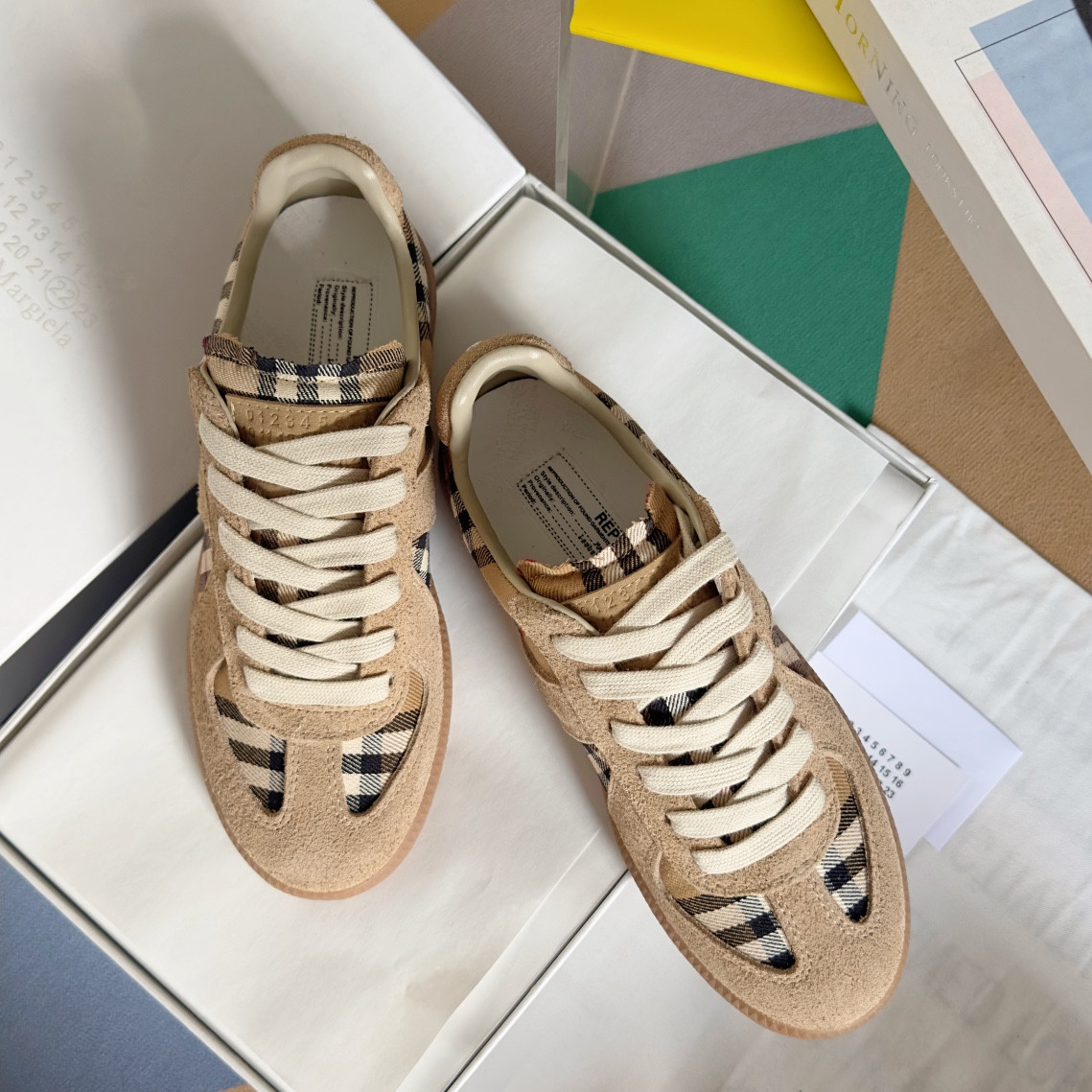 ua ma*s*n Ma*i*la mm6 sneakers