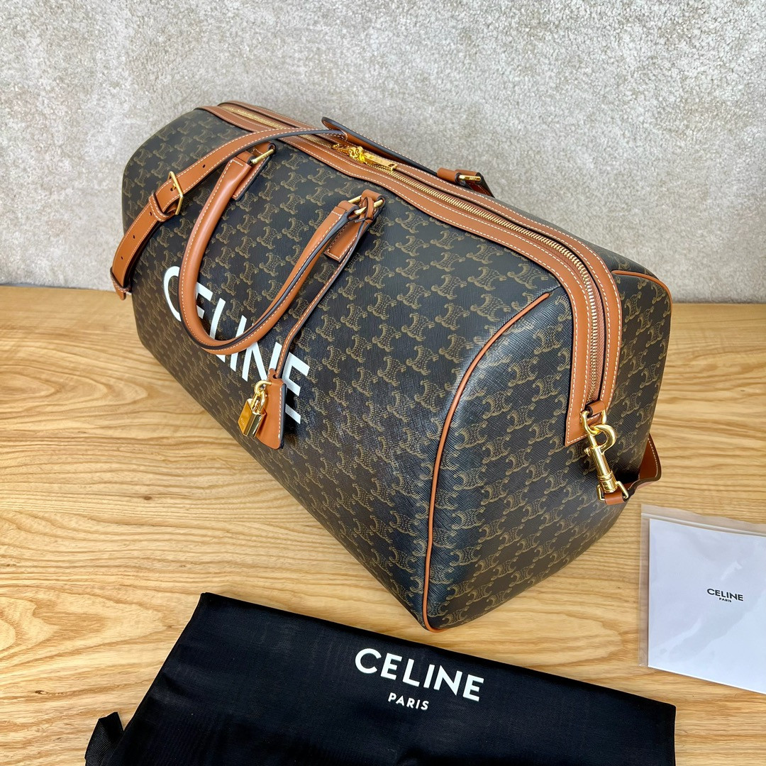 Ce**e large travel bag in triomphe canvas with Ce**e print 50x27x23cm