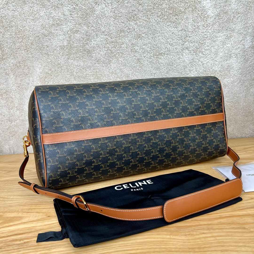Ce**e large travel bag in triomphe canvas with Ce**e print 50x27x23cm