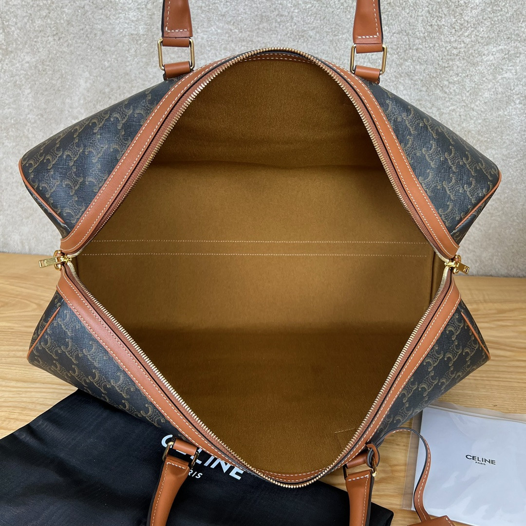 Ce**e large travel bag in triomphe canvas with Ce**e print 50x27x23cm